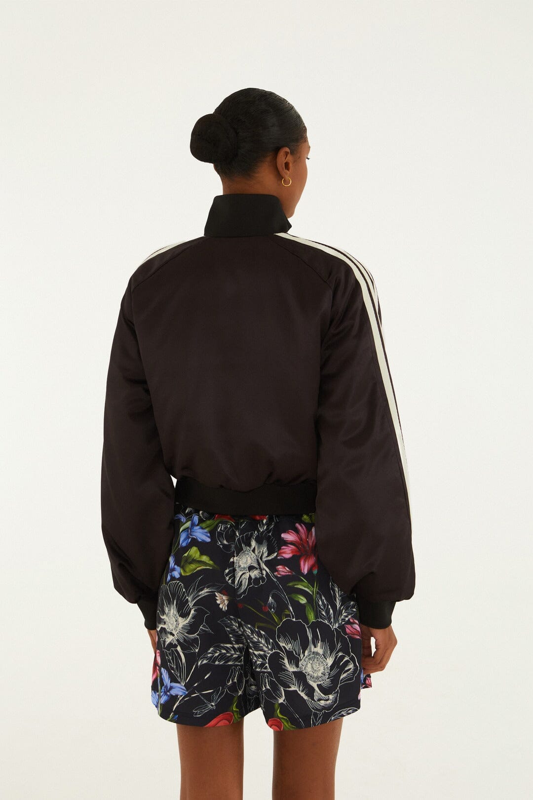 FARM Rio model wearing the Ainika Floral Black Adidas Track Top