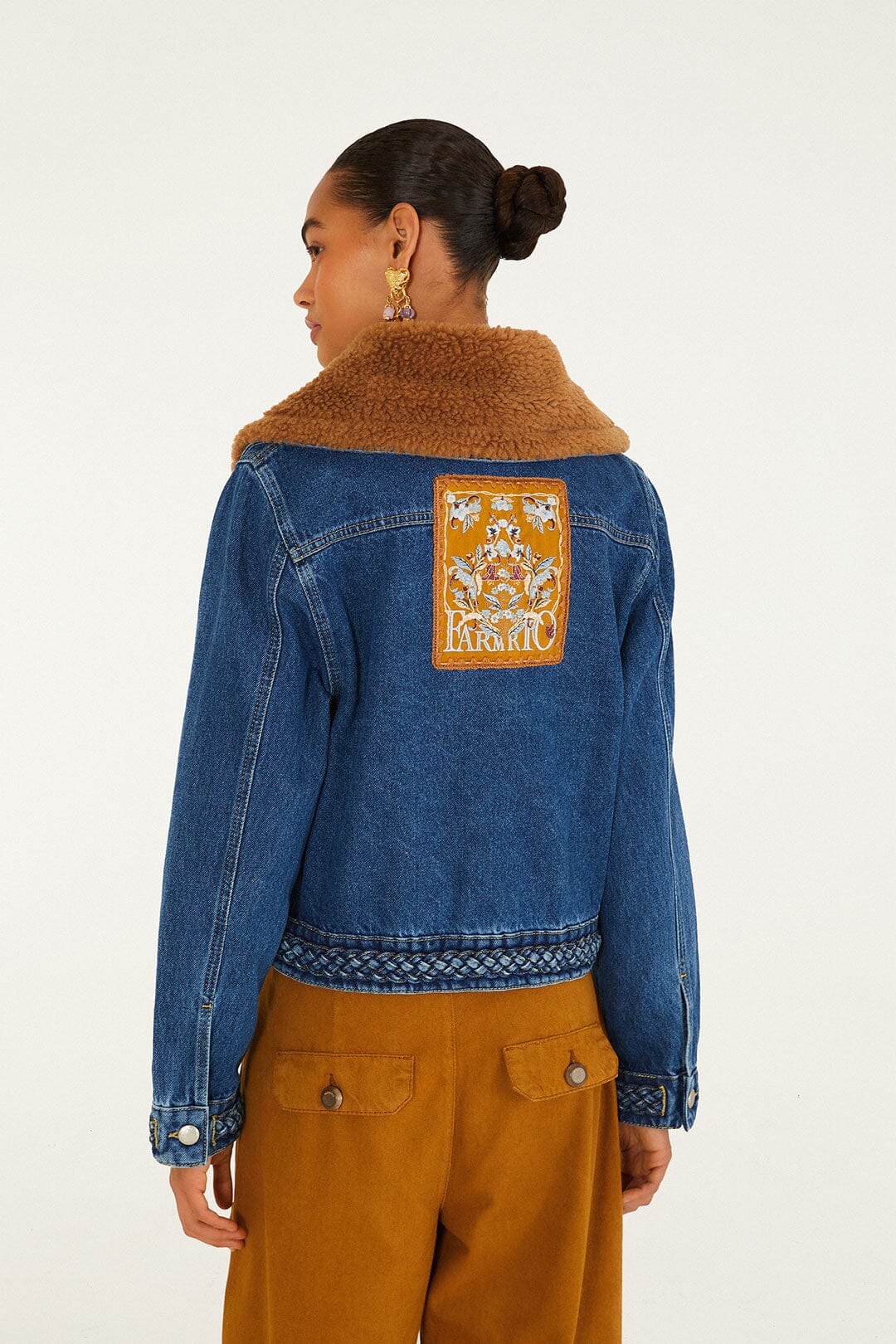 FARM Rio model wearing the Almost Famous Denim Jacket