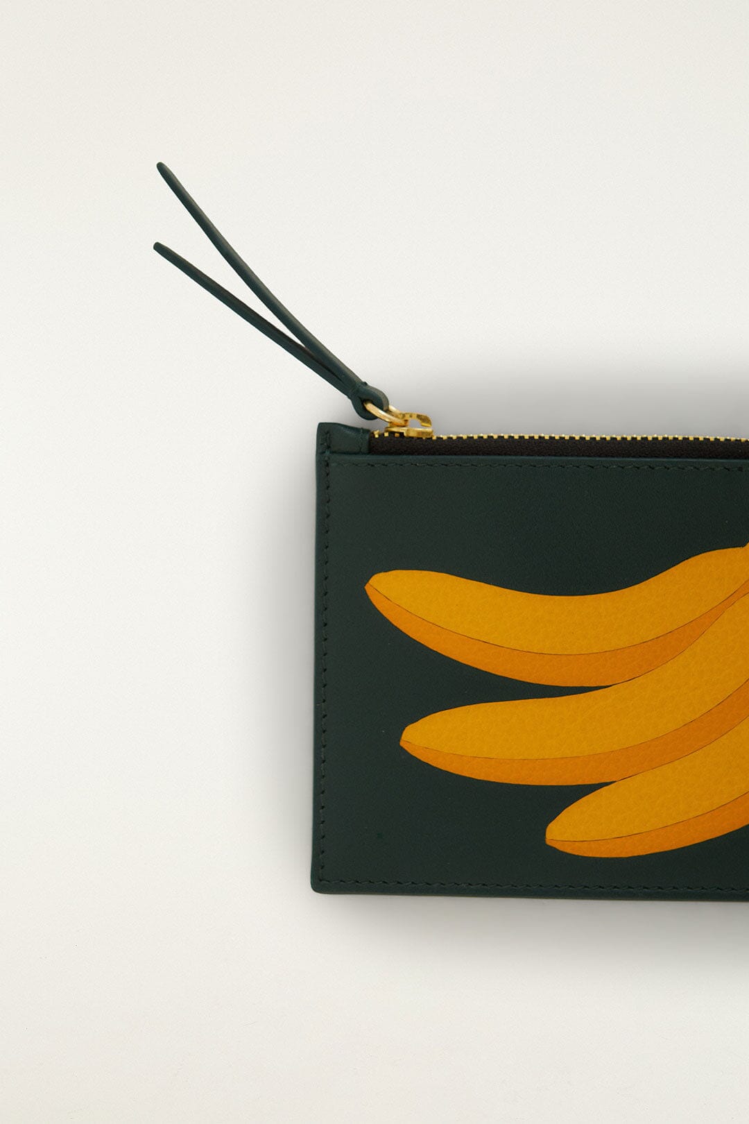 FARM Rio model wearing the Banana Wallet