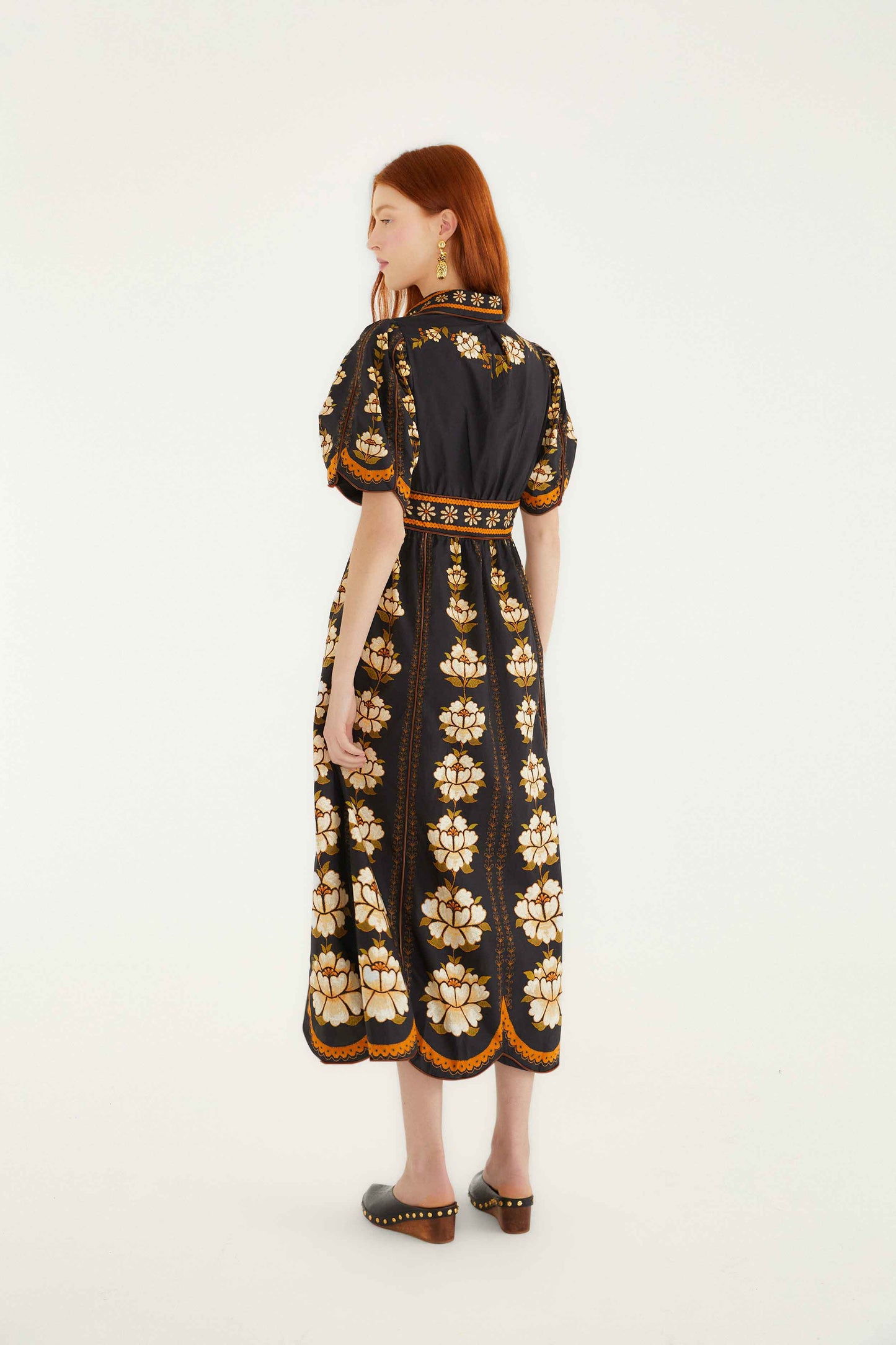 FARM Rio model wearing the Black Embroidered Flowers Organic Cotton Midi Dress