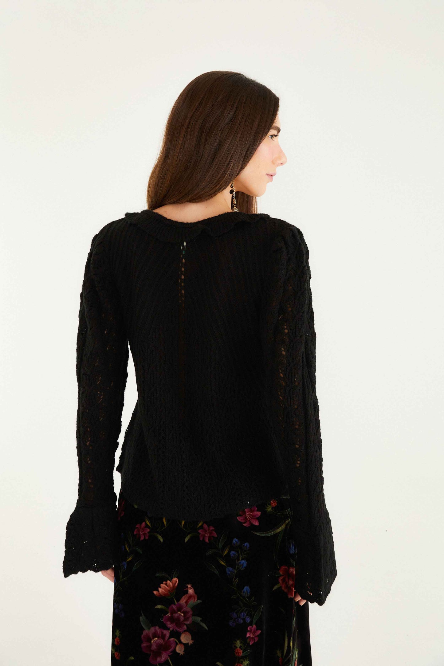 FARM Rio model wearing the Black Lace Ruffled Knit Cardigan