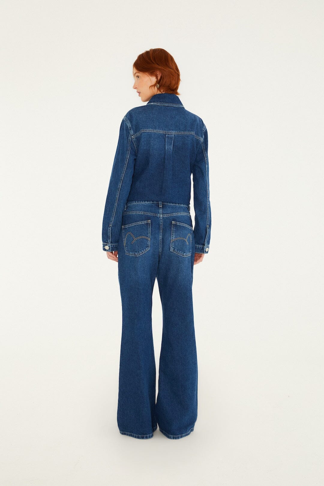 FARM Rio model wearing the Golden Gems Denim Flared Trousers
