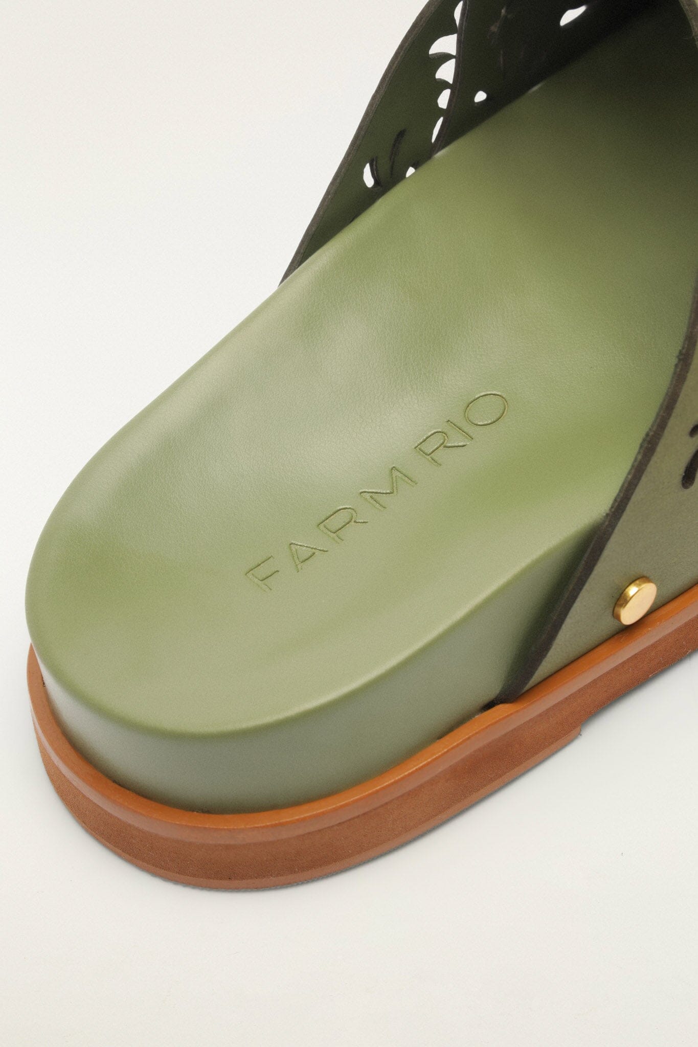 FARM Rio model wearing the Green Lace Leather Anatomic Slide Mule