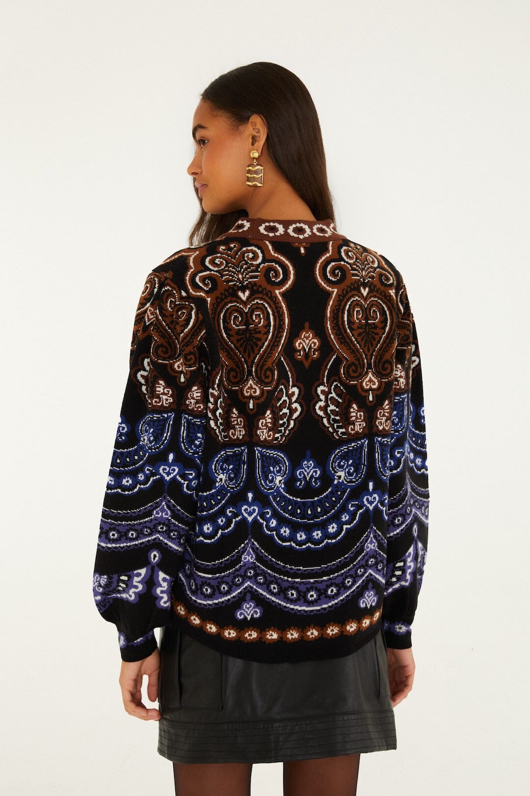 FARM Rio model wearing the Nicole Scarf Puff Sleeve Knit Sweater