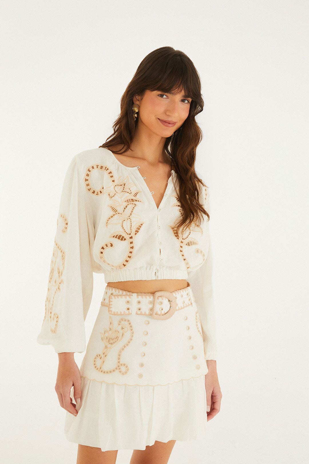 FARM Rio model wearing the Sand Richilieu Mini Skirt