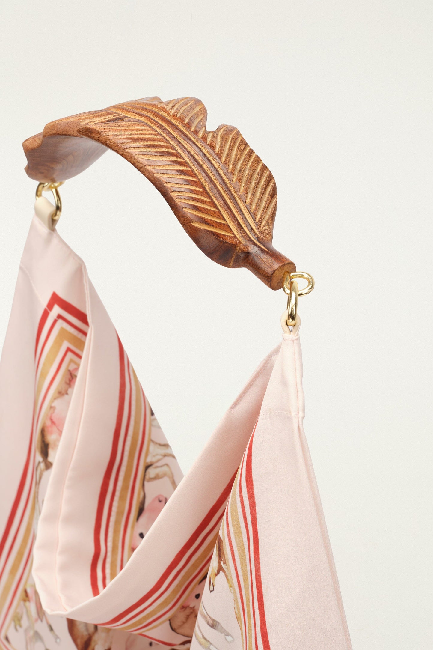 FARM Rio model wearing the Soft Pink Horses Satin Small Scarf Bag