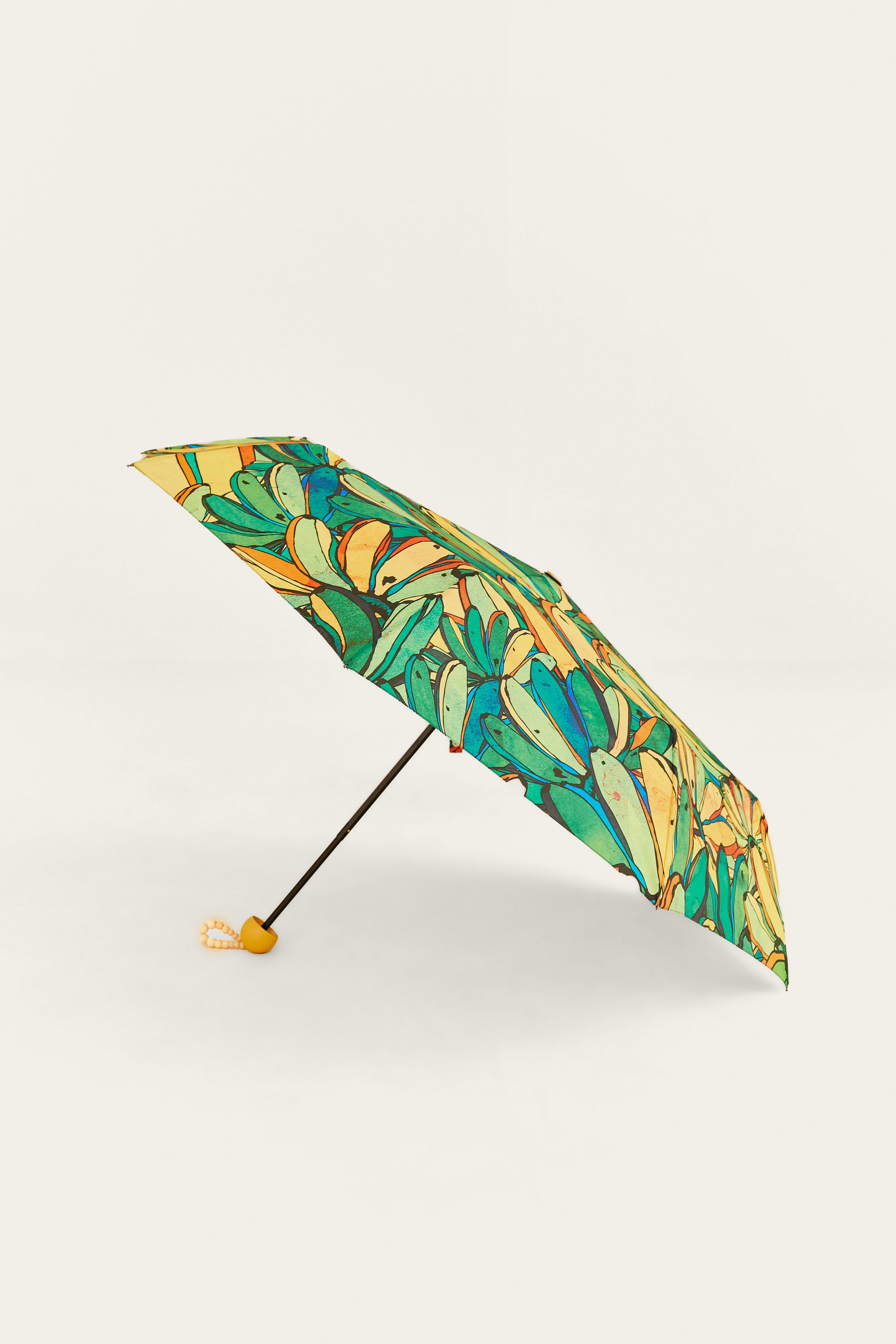 banana leaf patio umbrella FARM Rio Board Banana Umbrella