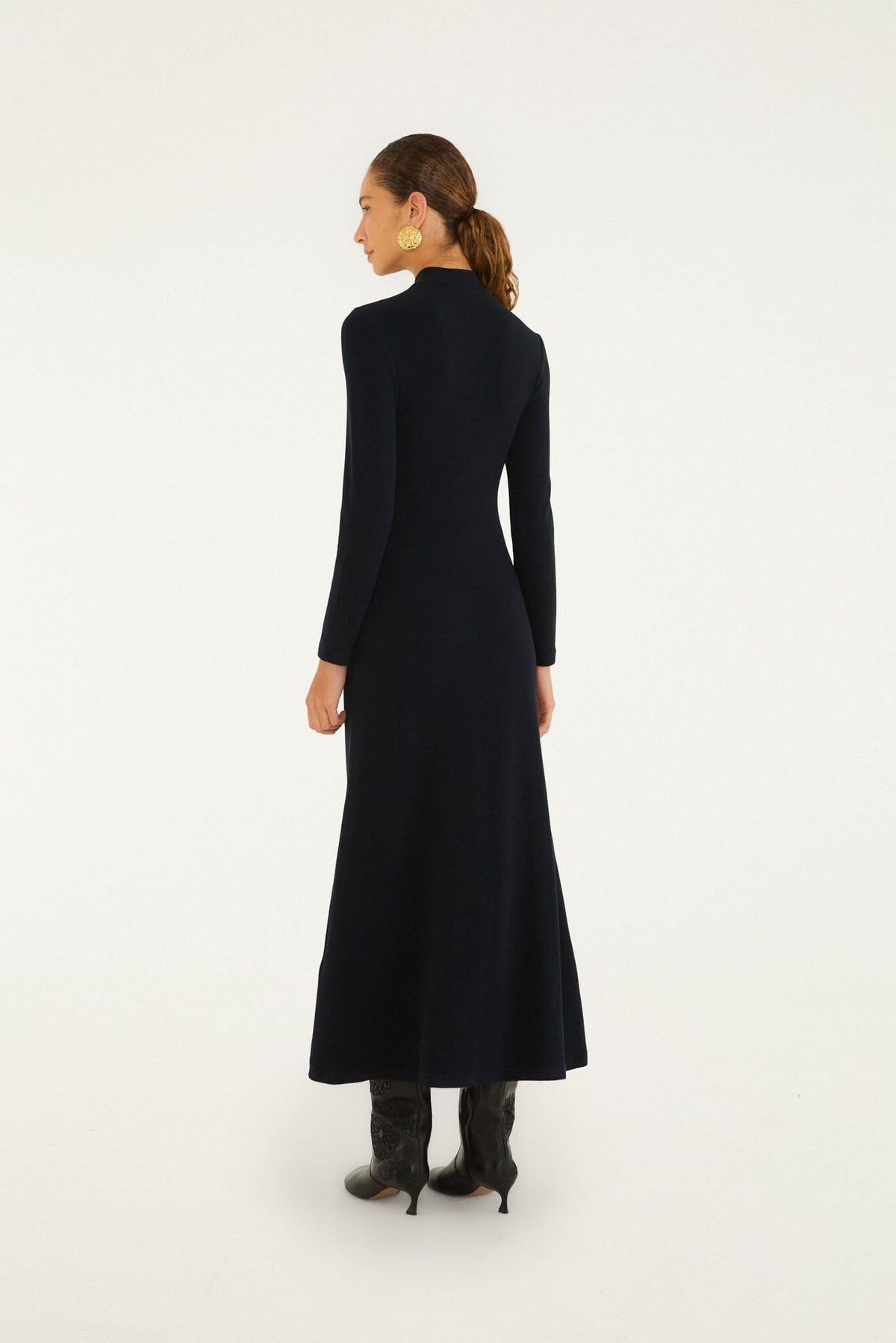 FARM Rio model wearing the 3d Flower Long Sleeve Maxi Dress