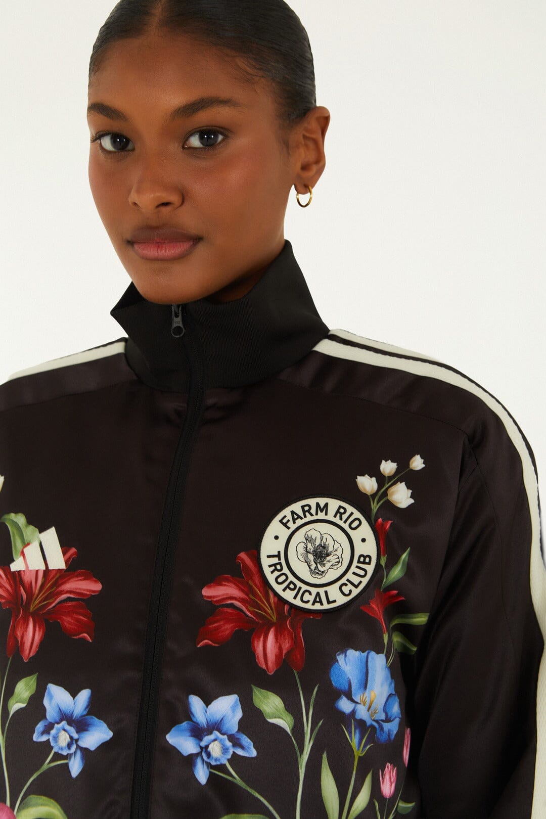 FARM Rio model wearing the Ainika Floral Black Adidas Track Top