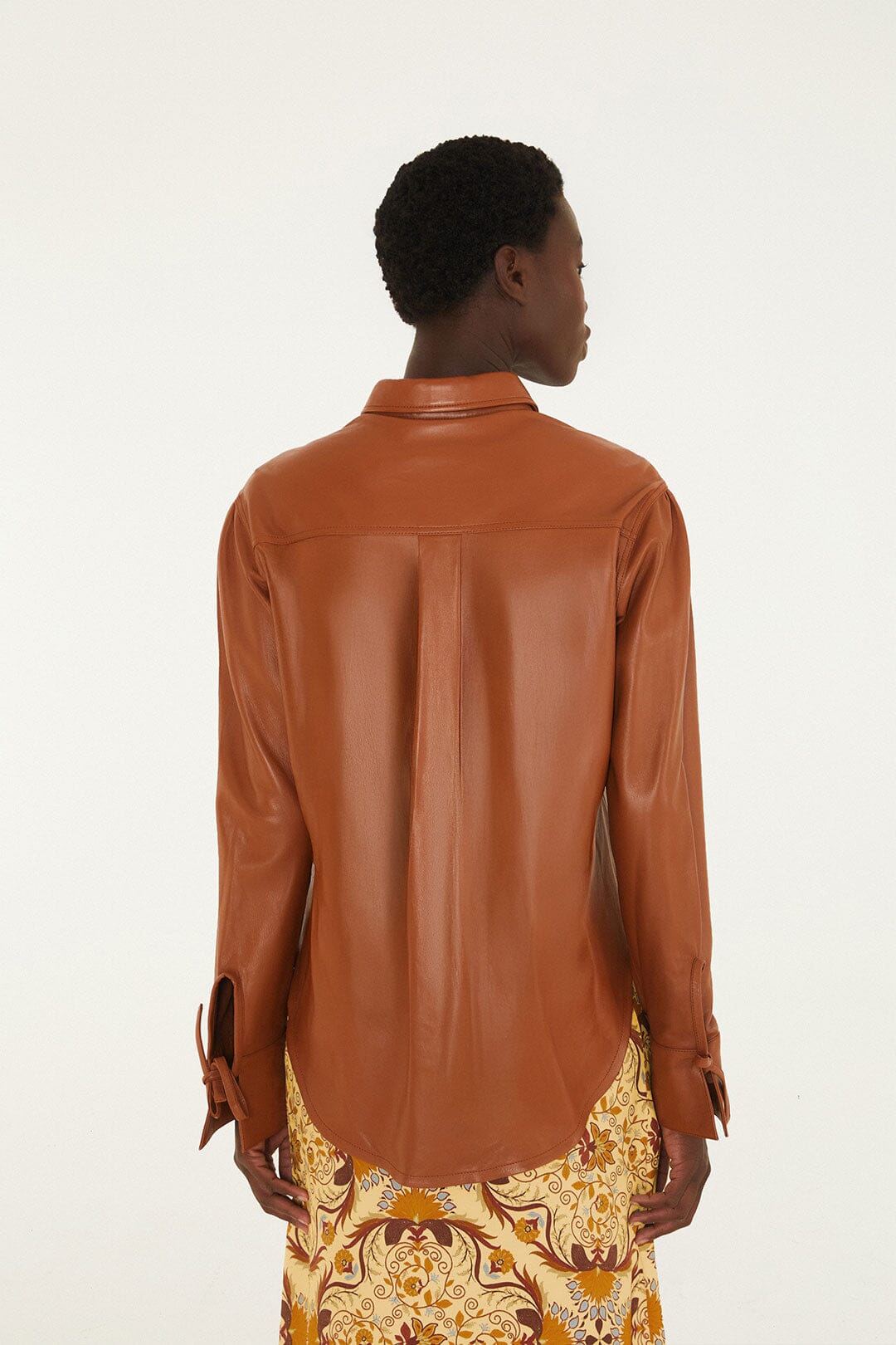 FARM Rio model wearing the Almost Famous Leather Shirt