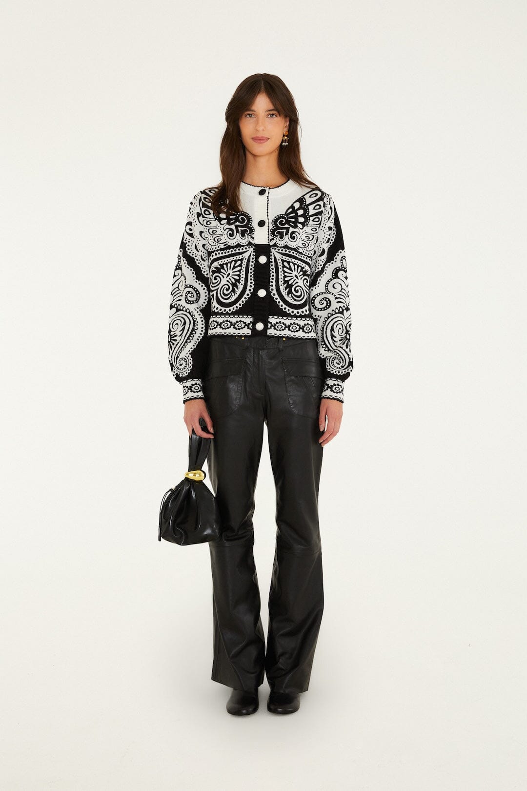 FARM Rio model wearing the Arabesque Butterlfy Buttoned Knit Cardigan