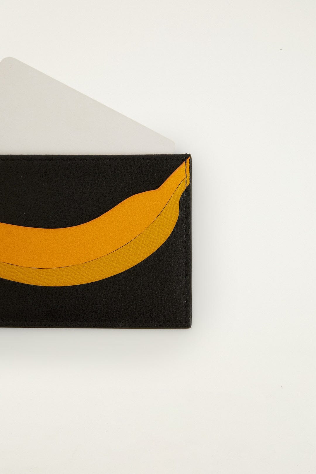 FARM Rio model wearing the Banana Card Holder