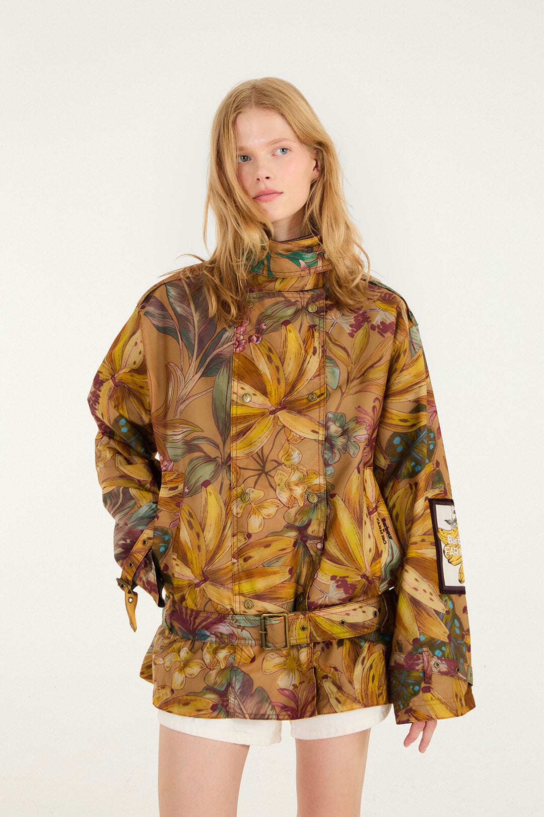 FARM Rio model wearing the Banana Groove High Neck Wax Coat