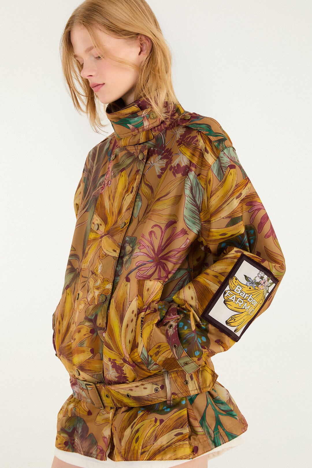 FARM Rio model wearing the Banana Groove High Neck Wax Coat