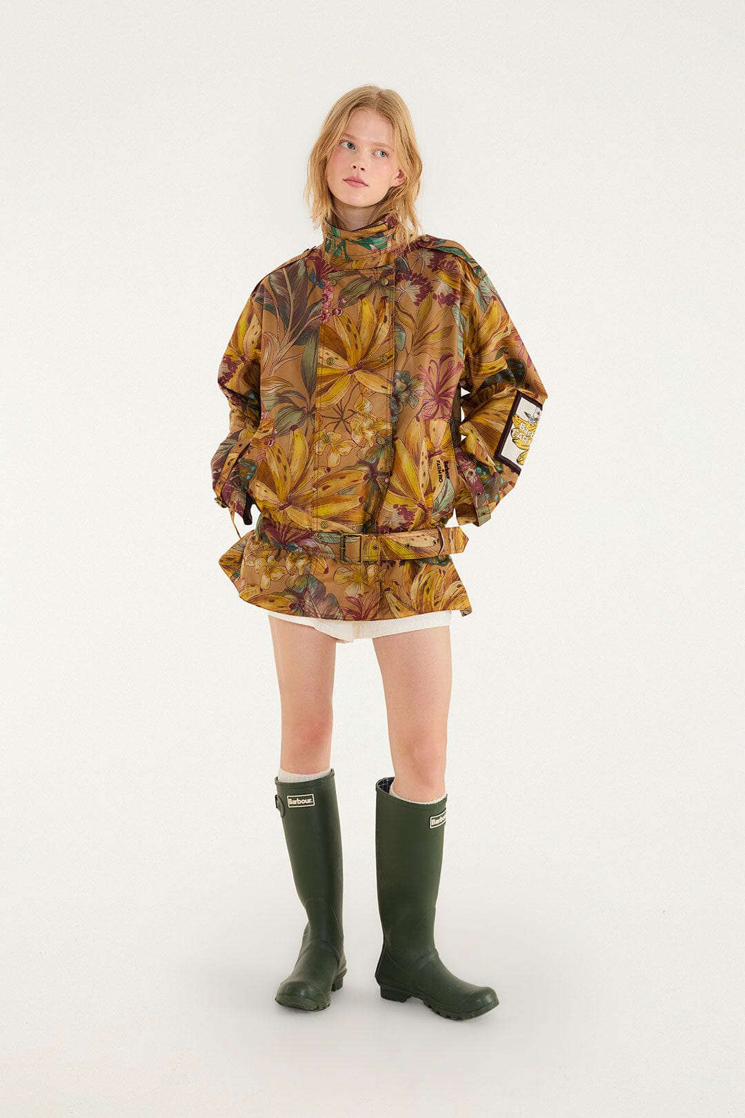 FARM Rio model wearing the Banana Groove High Neck Wax Coat