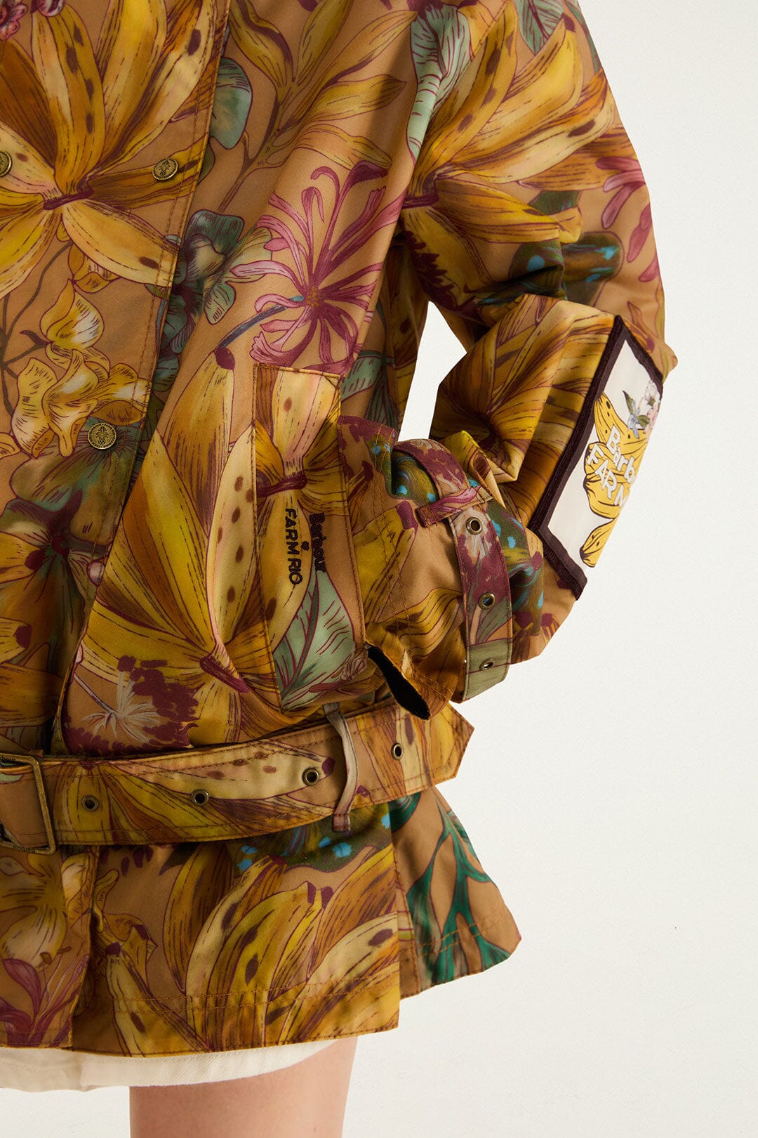 FARM Rio model wearing the Banana Groove High Neck Wax Coat