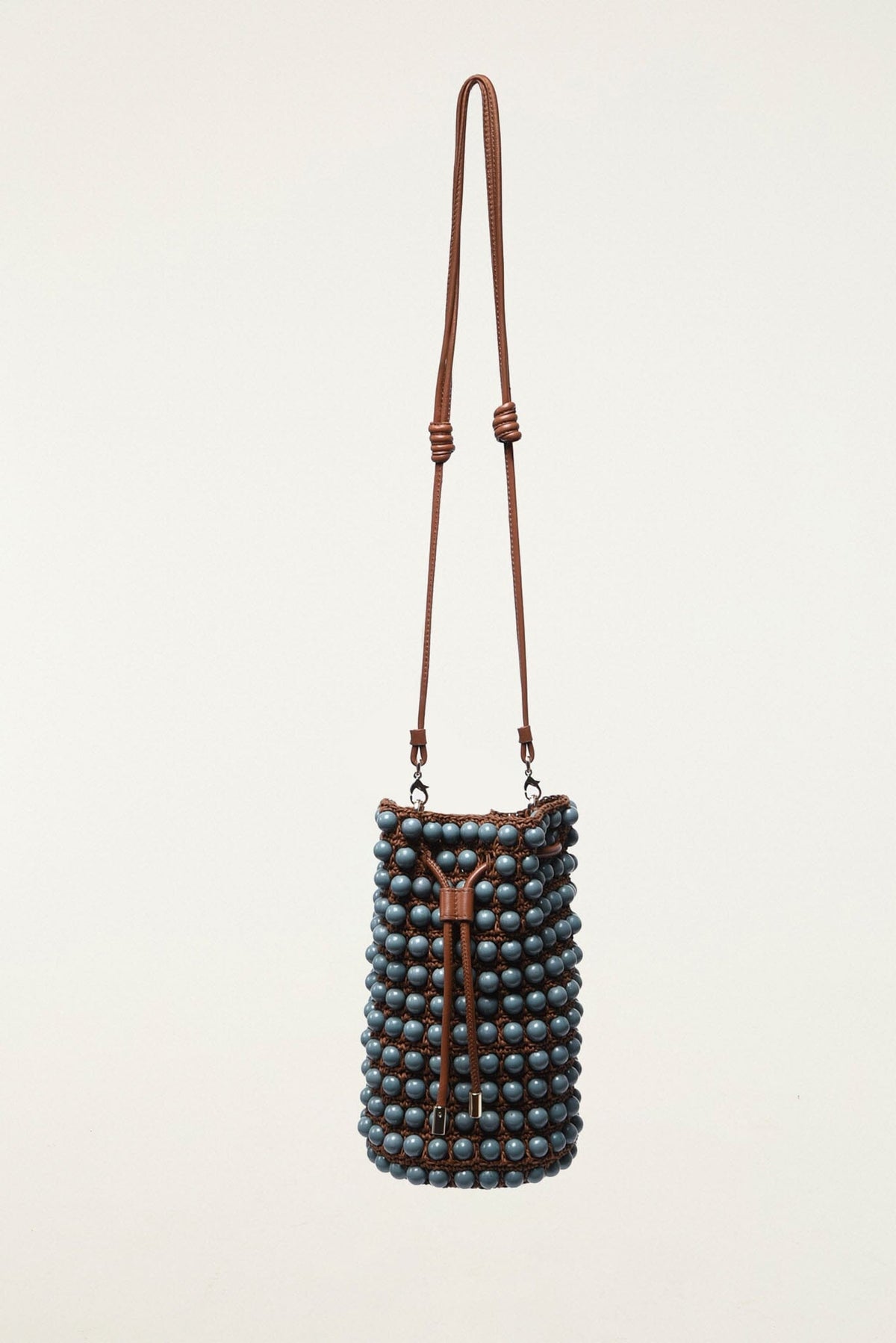 FARM Rio model wearing the Beaded Macrame Bucket Bag