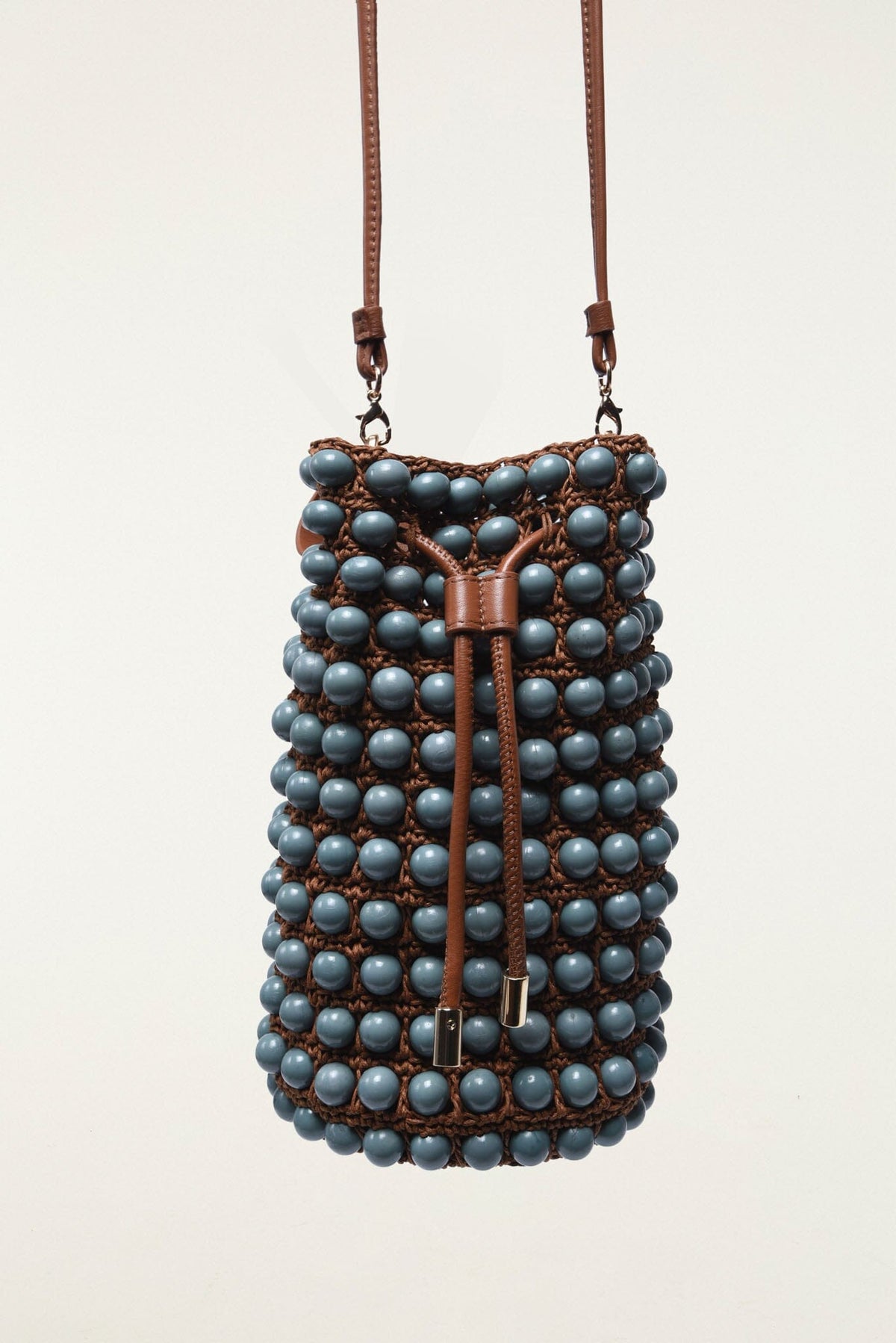 FARM Rio model wearing the Beaded Macrame Bucket Bag