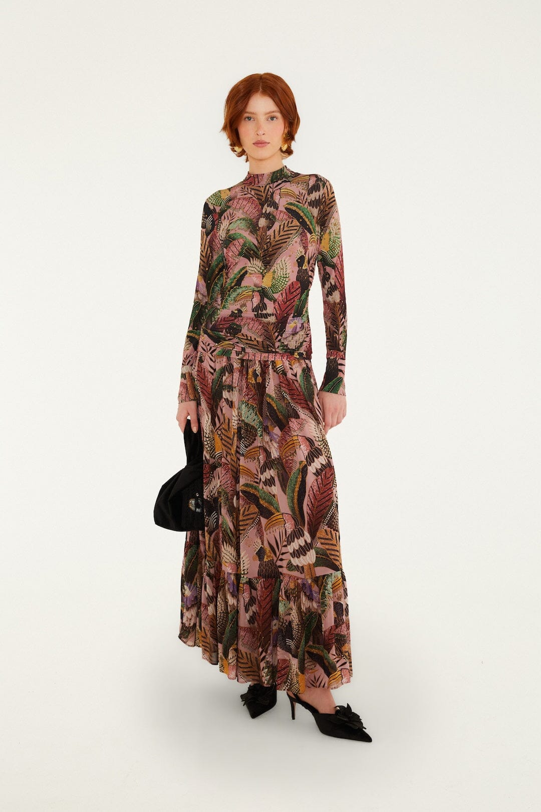 FARM Rio model wearing the Birds Blush Ruffled Hem Maxi Skirt