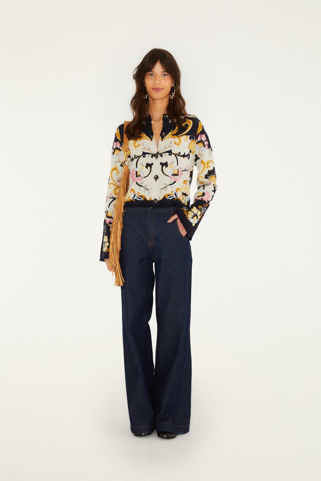 FARM Rio model wearing the Birds Romance Buttoned Knit Cardigan