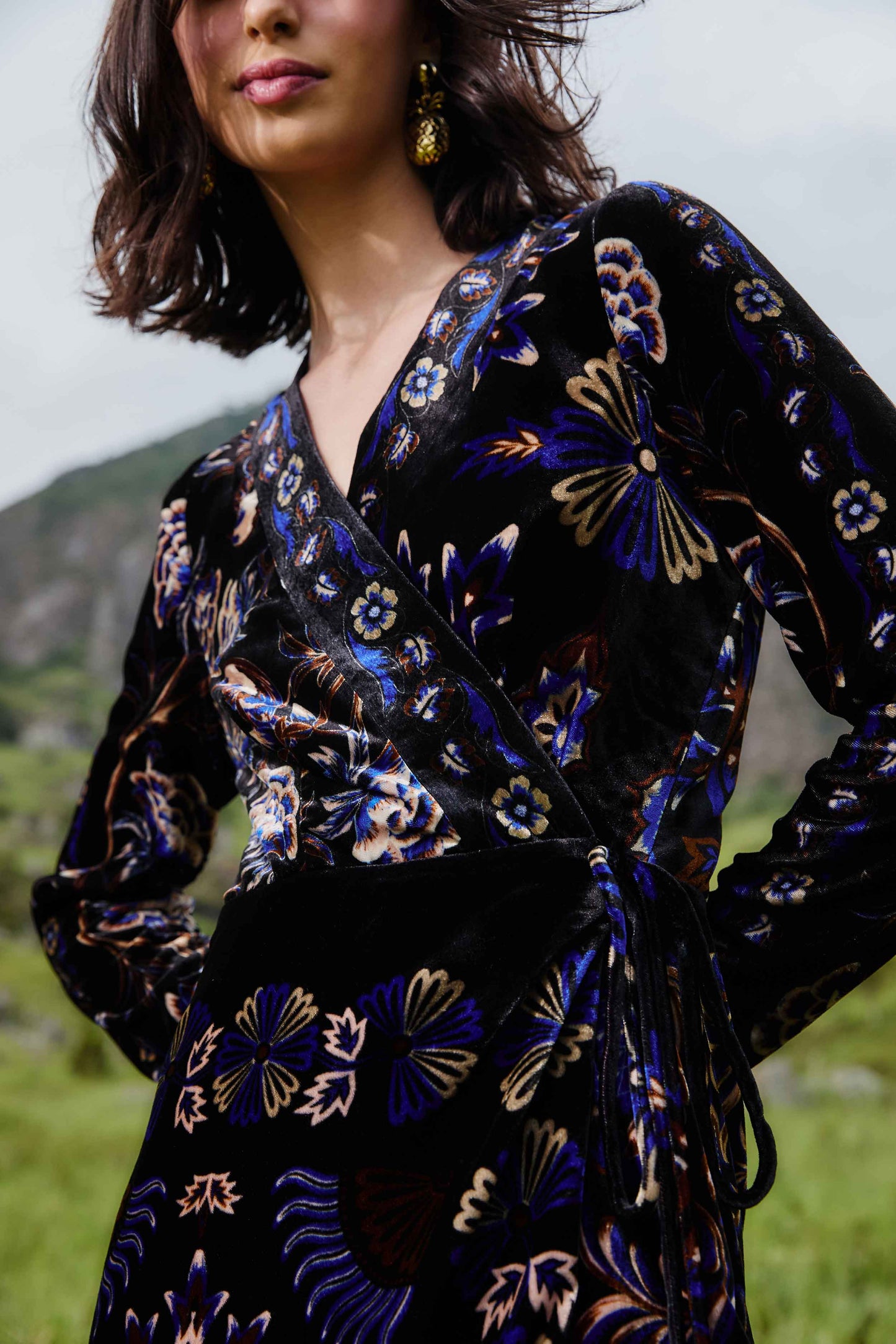 FARM Rio model wearing the Black Arabesque Mix Scarves Wrap Mini Dress