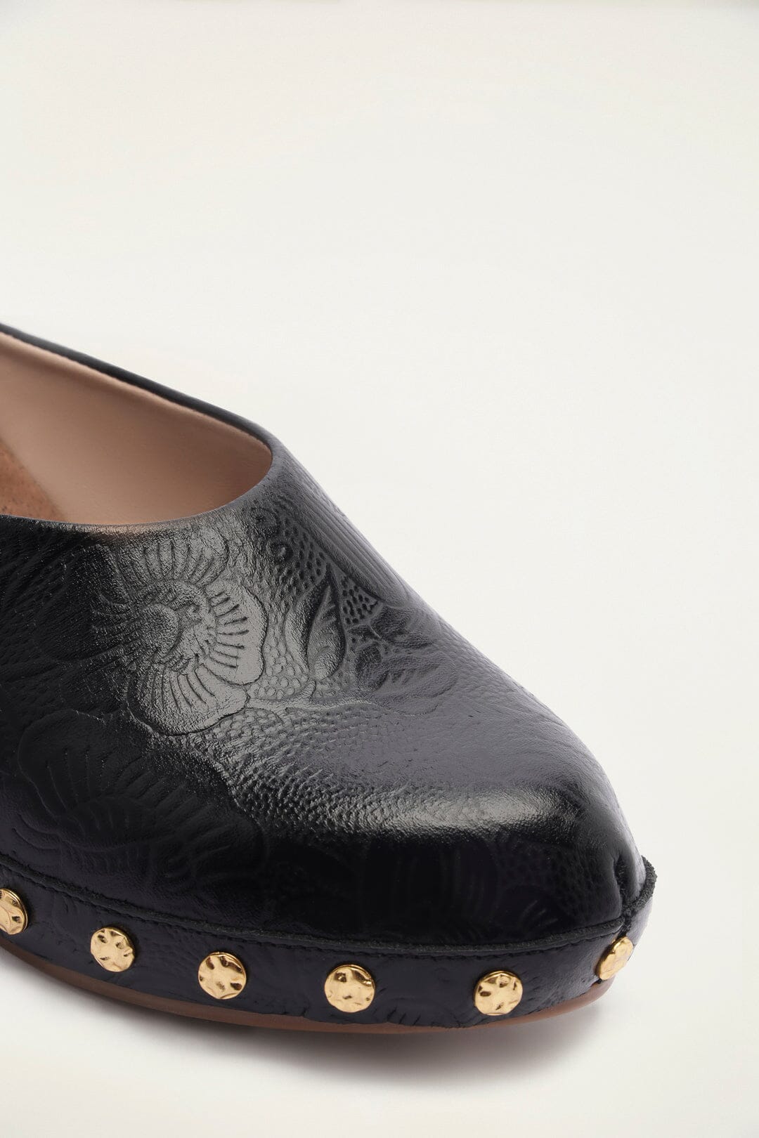 FARM Rio model wearing the Black Embossed Wedge Clog