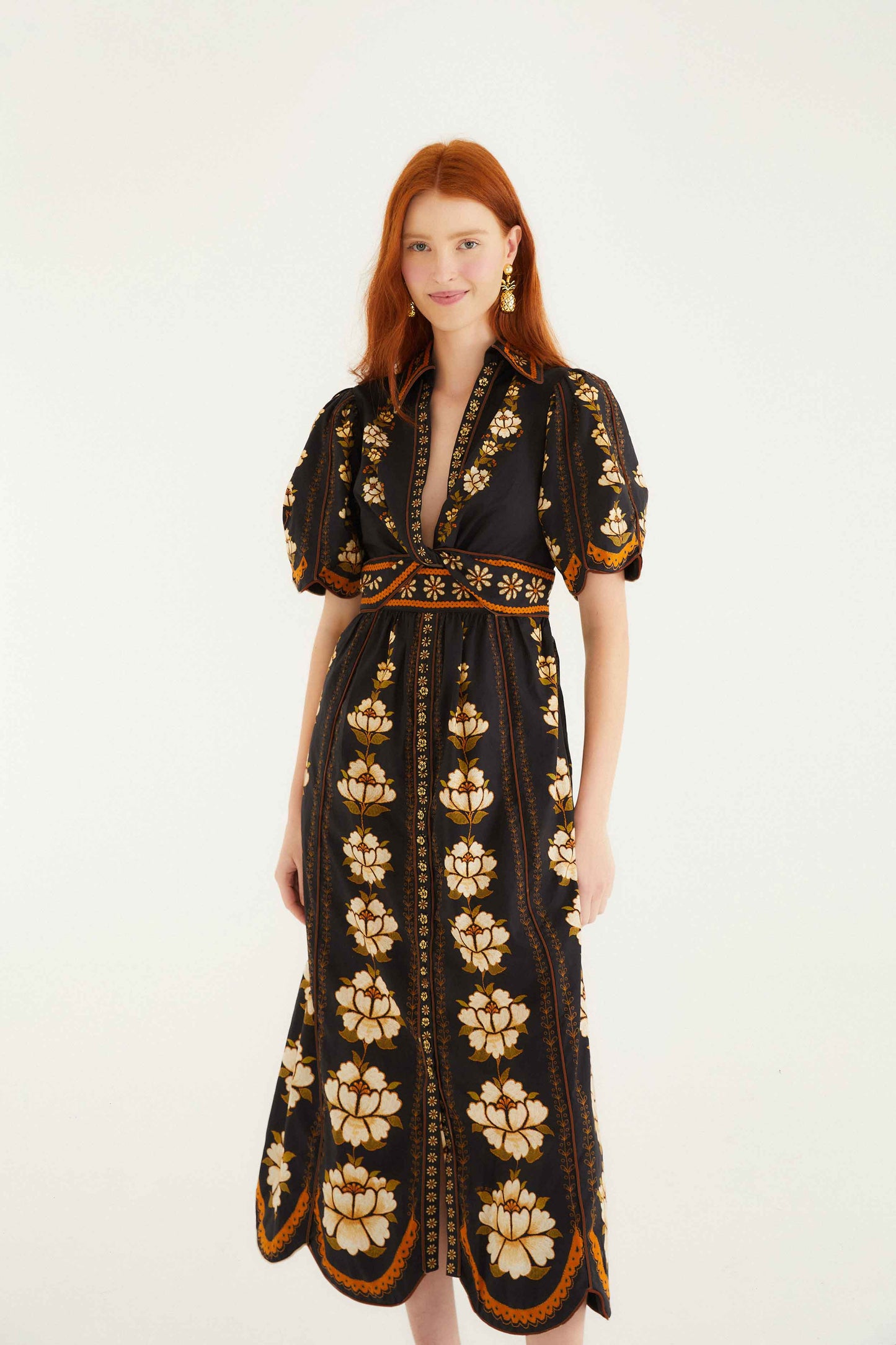 FARM Rio model wearing the Black Embroidered Flowers Organic Cotton Midi Dress