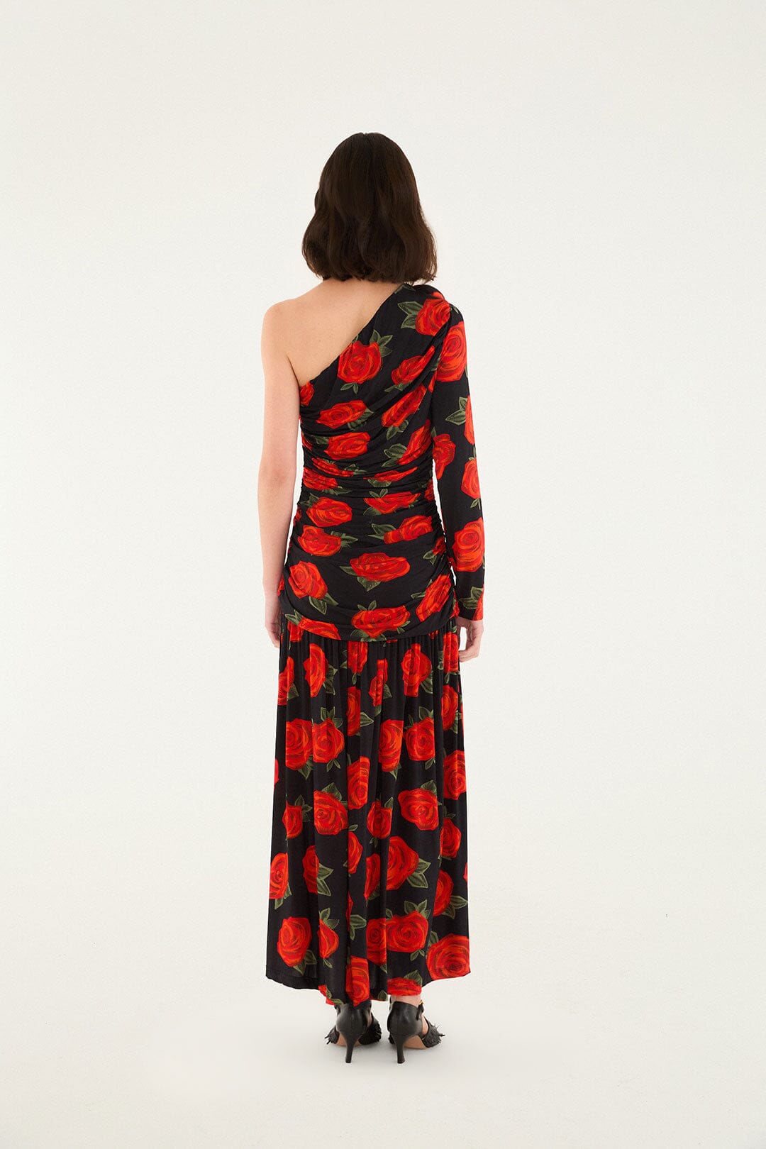 FARM Rio model wearing the Black Latin Roses 3d Flower One-Shoulder Draped Maxi Dress