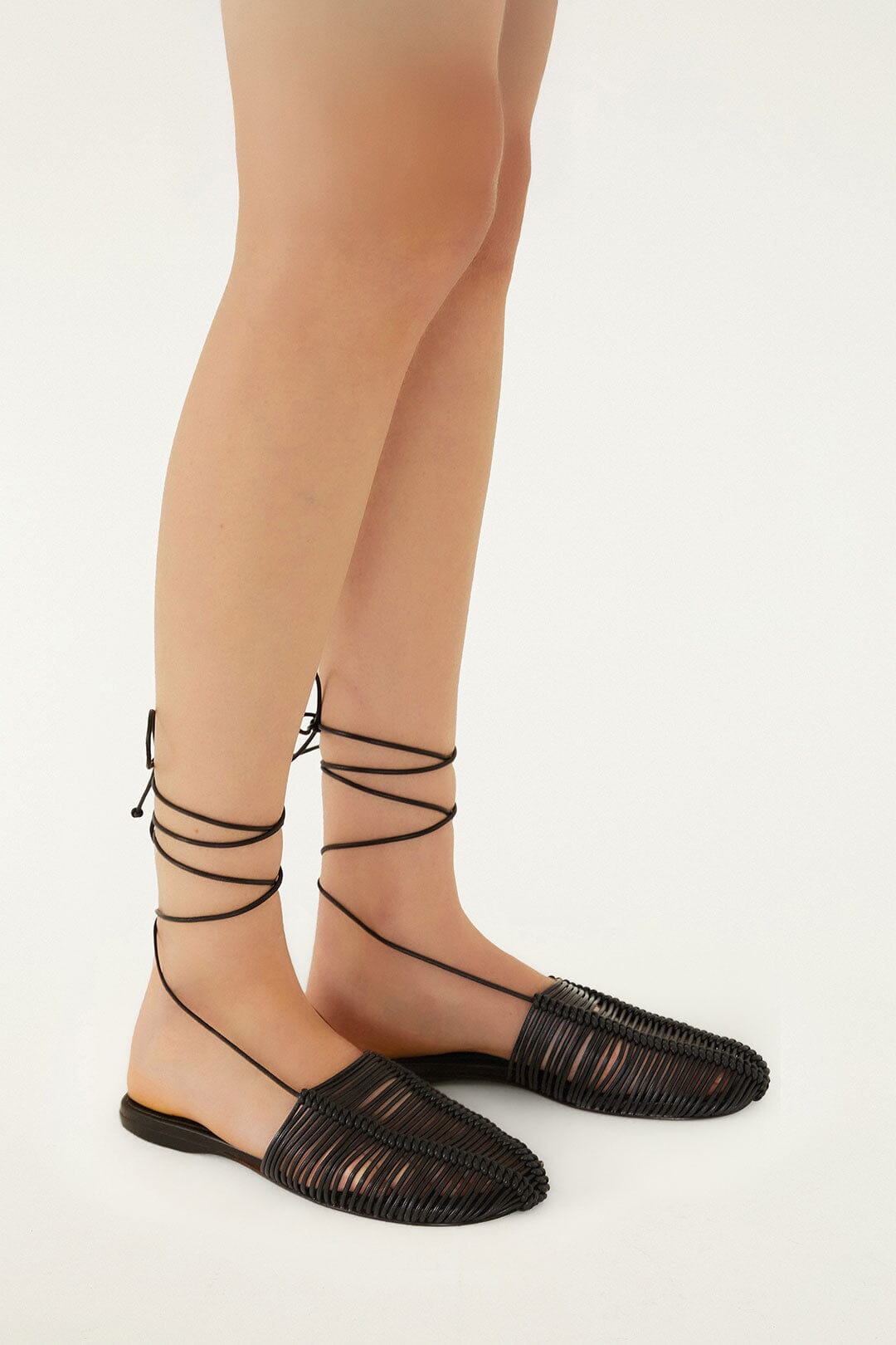 FARM Rio model wearing the Black Macrame Mule