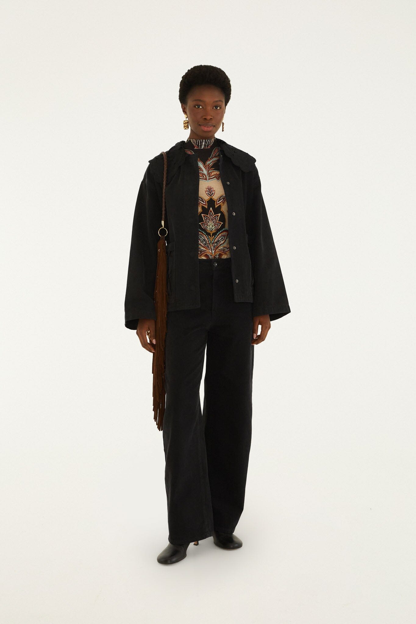 FARM Rio model wearing the Black Richelieu Denim Trousers