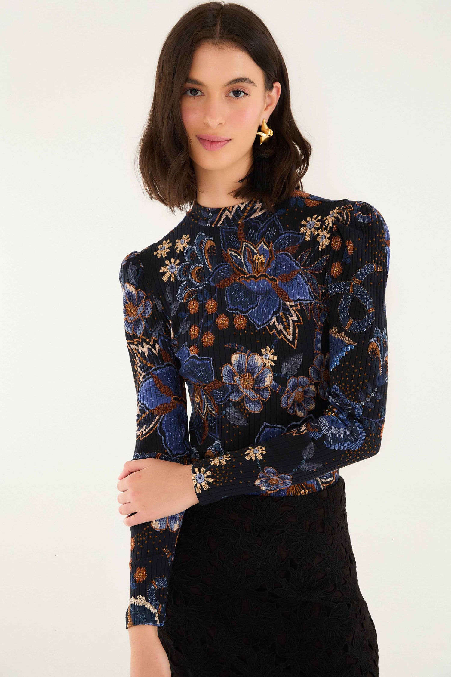 FARM Rio model wearing the Black Snakes Bouquet Organic Cotton Bodysuit