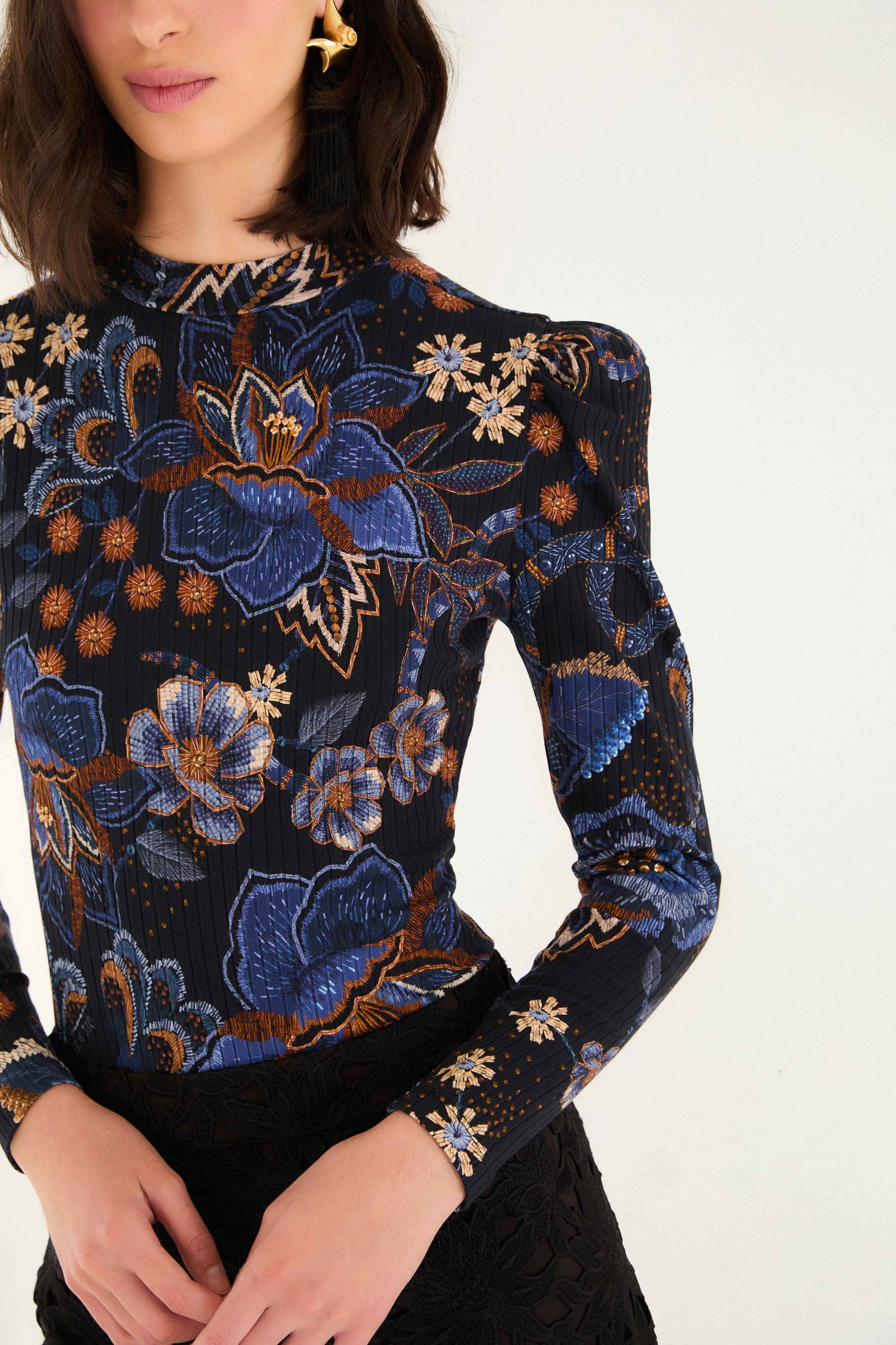 FARM Rio model wearing the Black Snakes Bouquet Organic Cotton Bodysuit