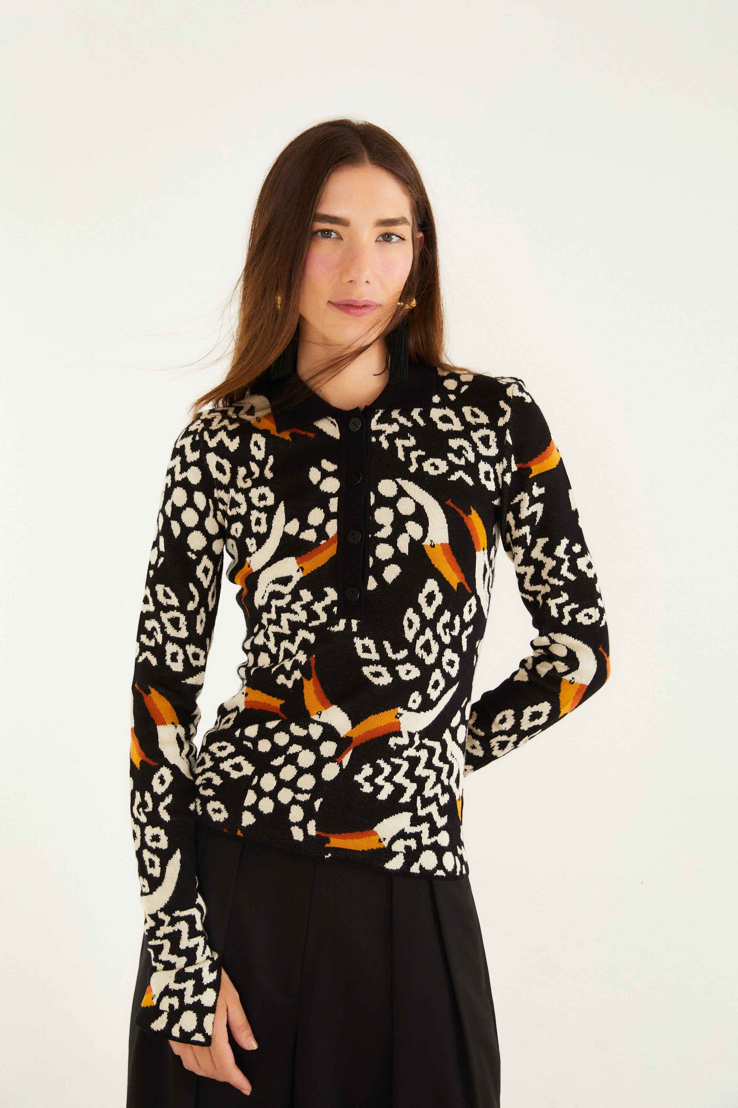 FARM Rio model wearing the Black Tucanissimo Long Sleeve Polo Knit Top