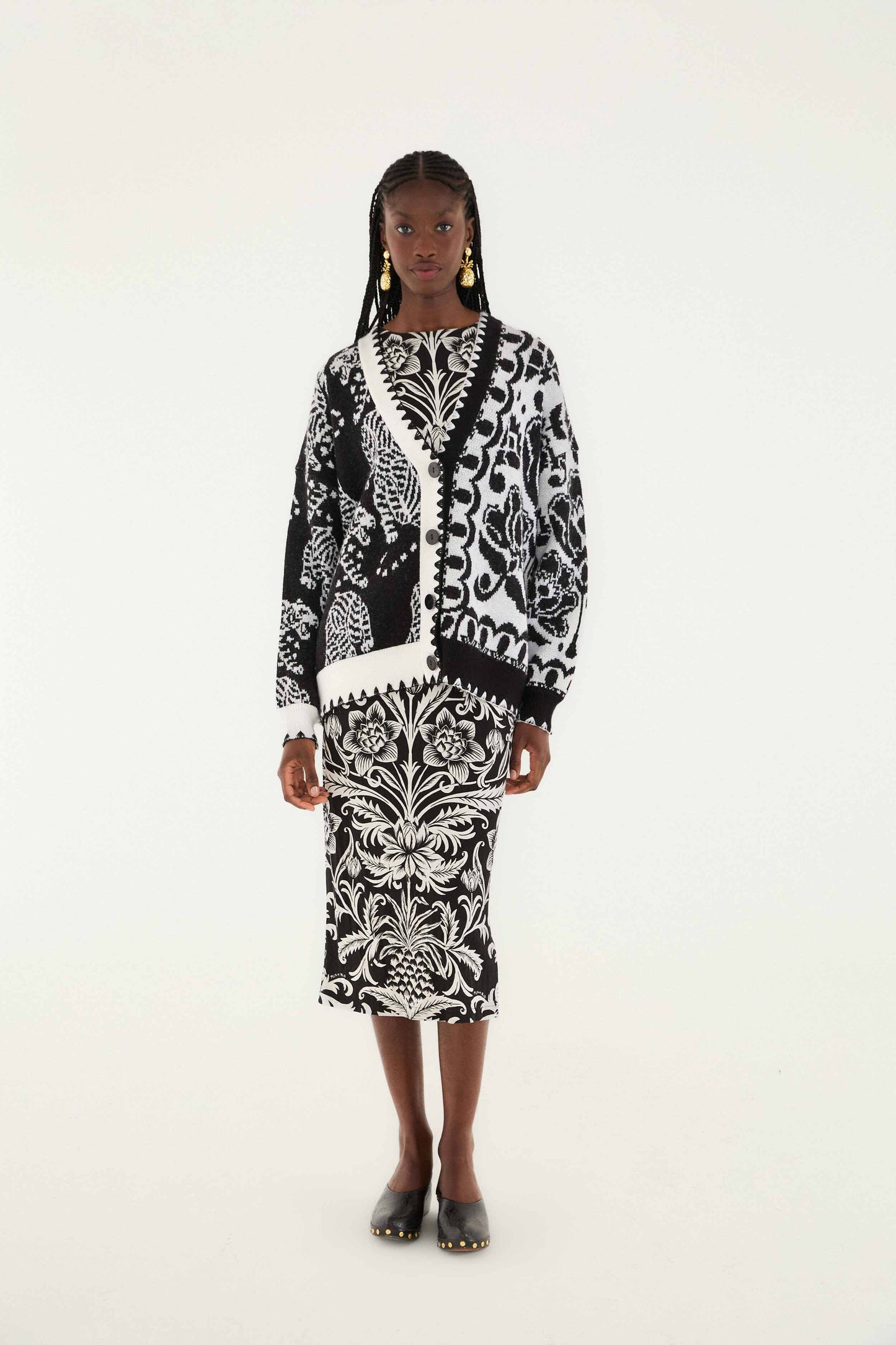 FARM Rio model wearing the Black & White Mixed Striped Tigers Buttoned Knit Cardigan