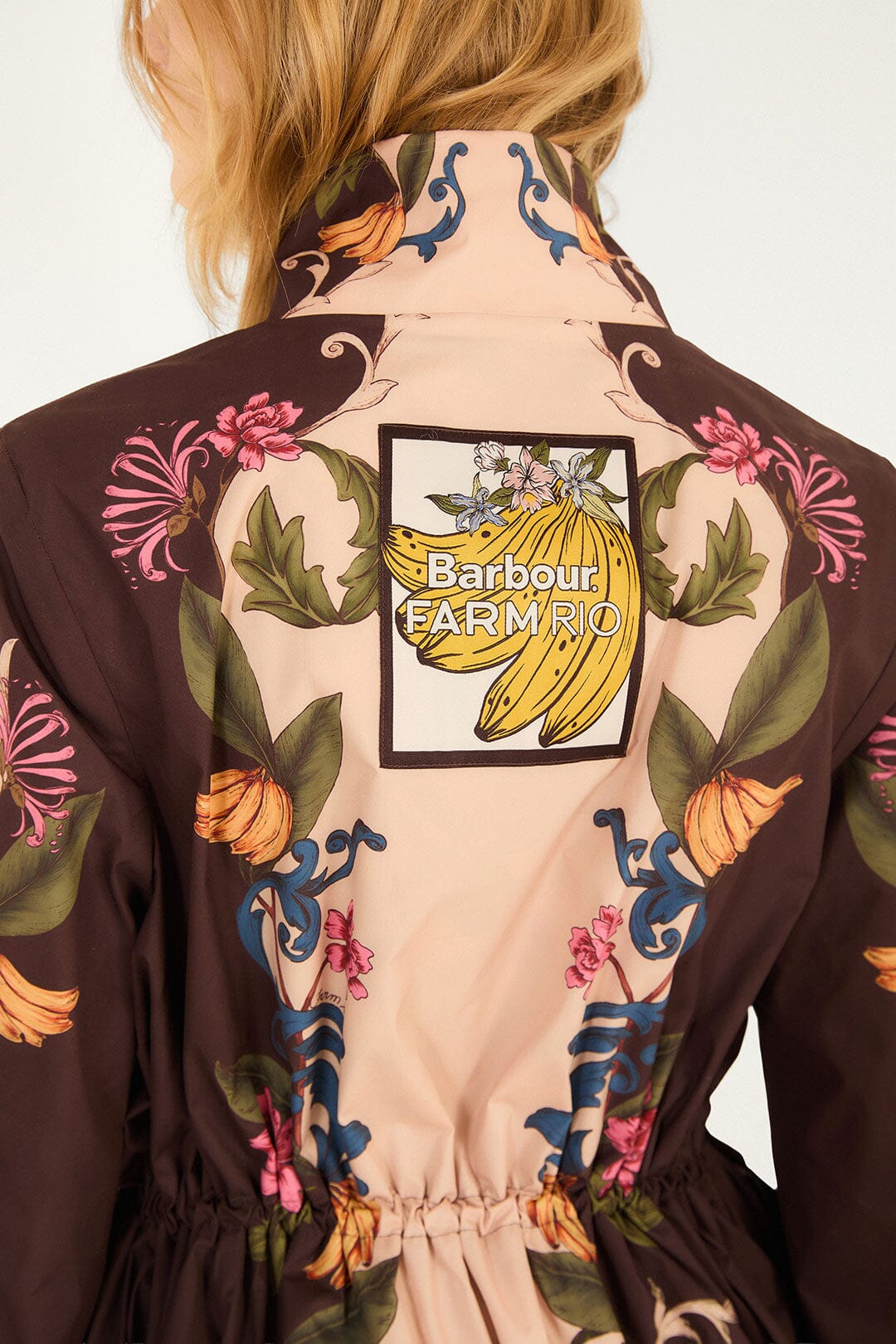 FARM Rio model wearing the Bloom In Between Drawstring Raincoat