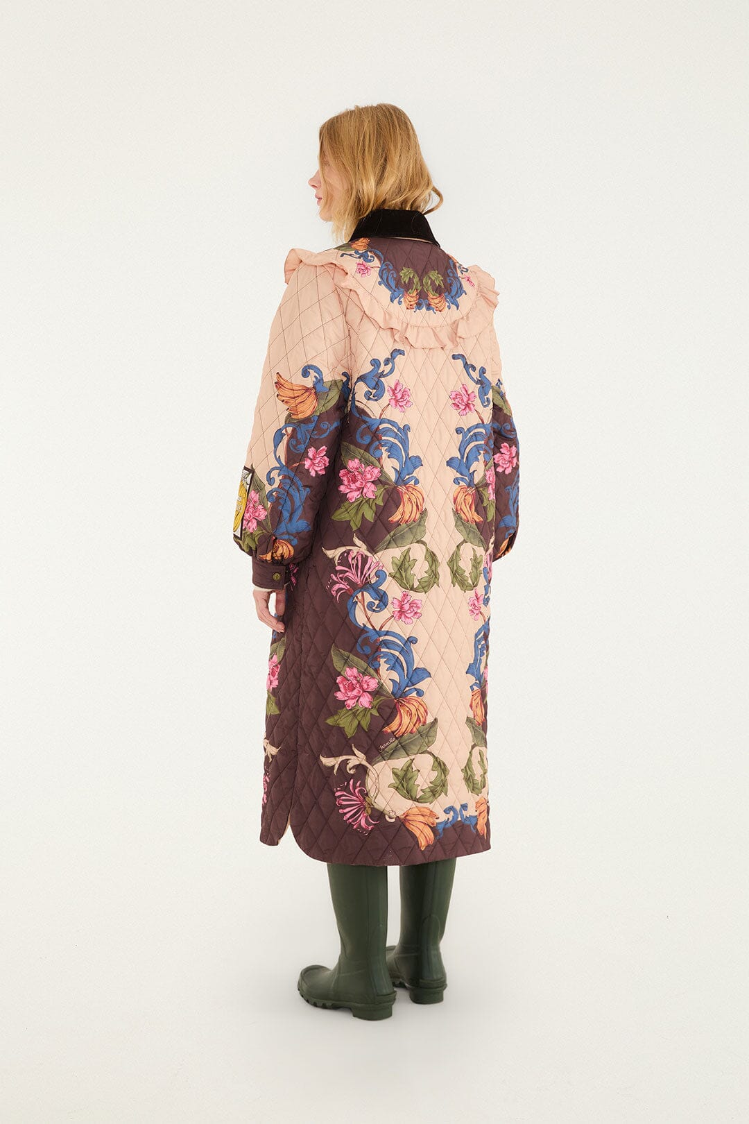 FARM Rio model wearing the Bloom In Between Quilted Midi Coat