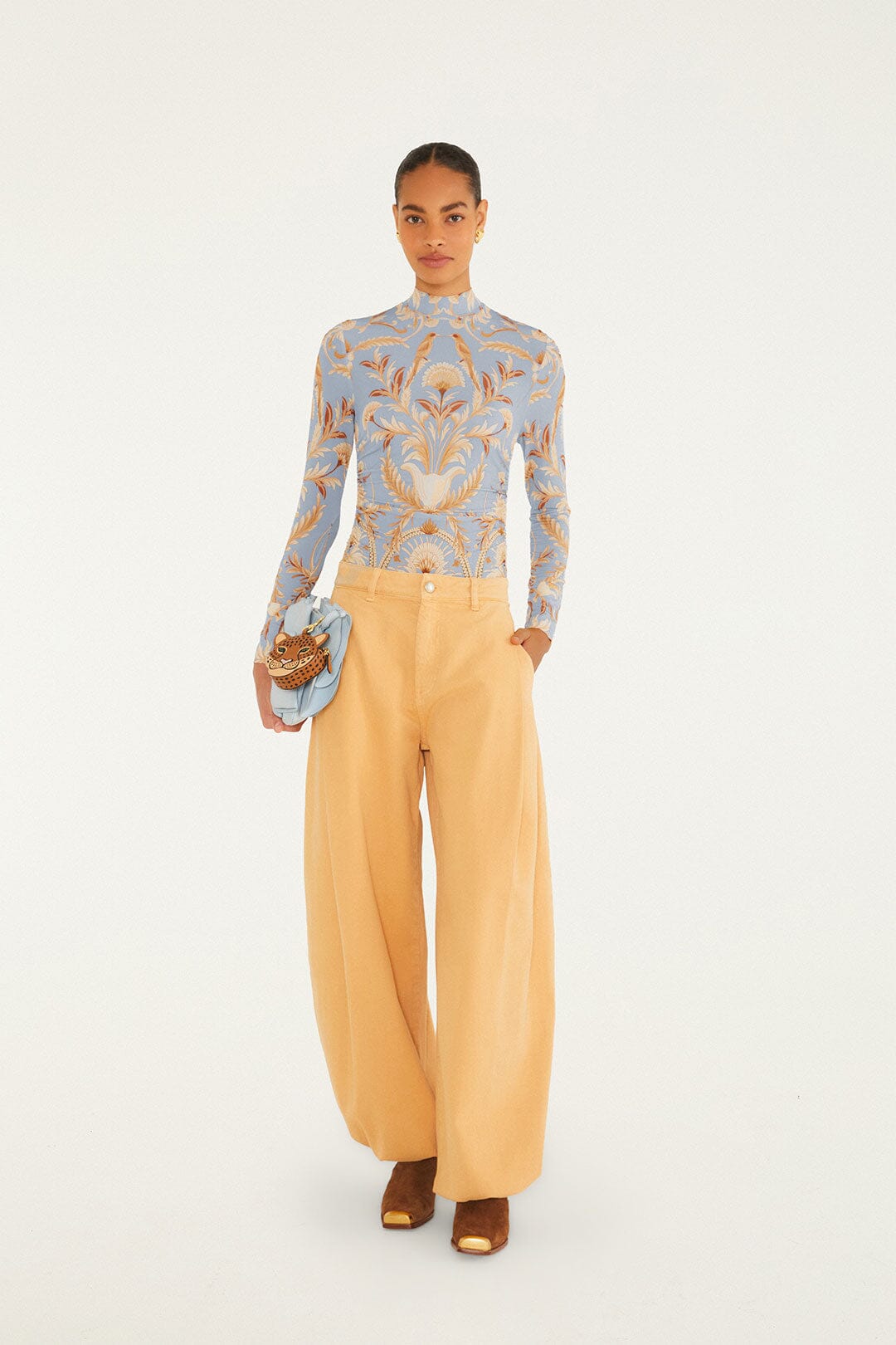 FARM Rio model wearing the Blooming Garden Jersey Blouse