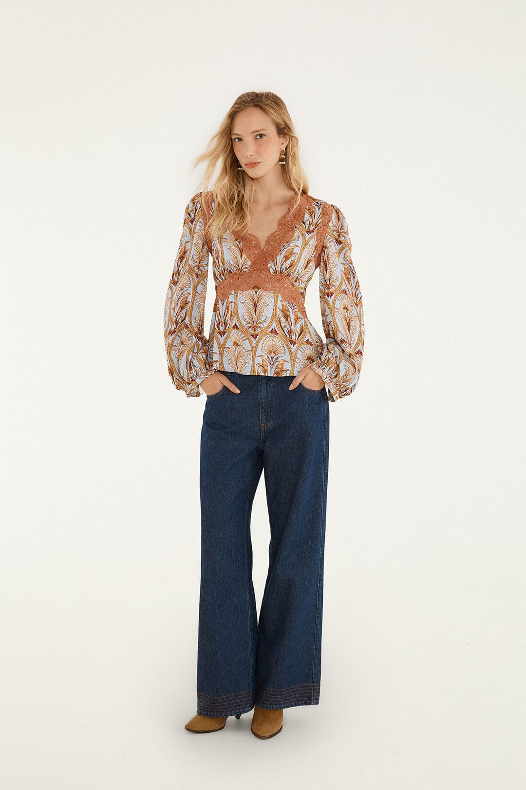 FARM Rio model wearing the Blooming Garden Long Sleeve Blouse