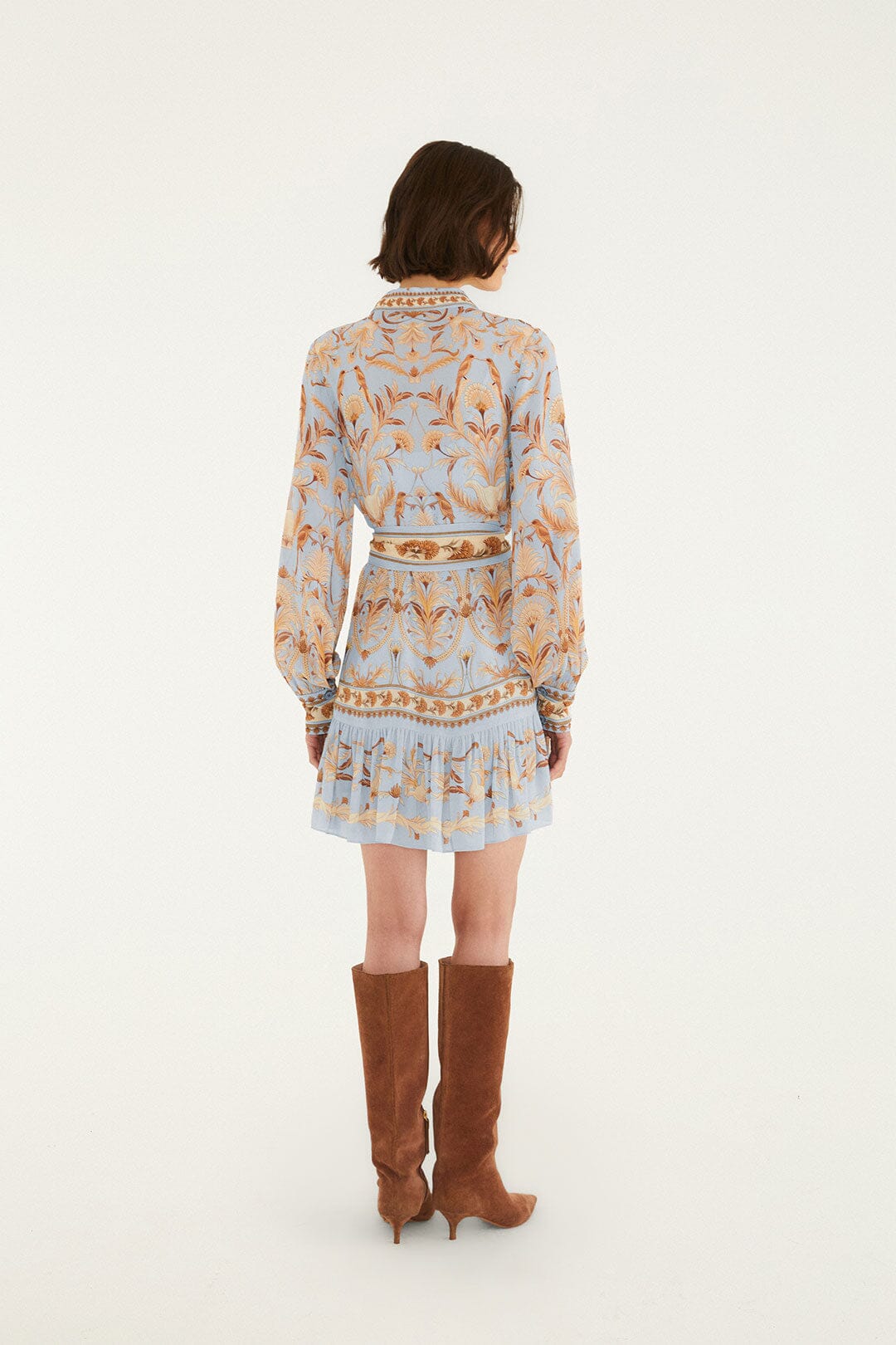 FARM Rio model wearing the Blooming Garden Long Sleeve Mini Dress