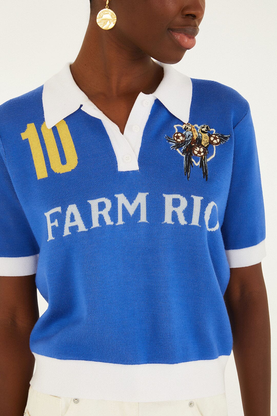 FARM Rio model wearing the Blue And White Copa Short Sleeve Knit Polo Shirt