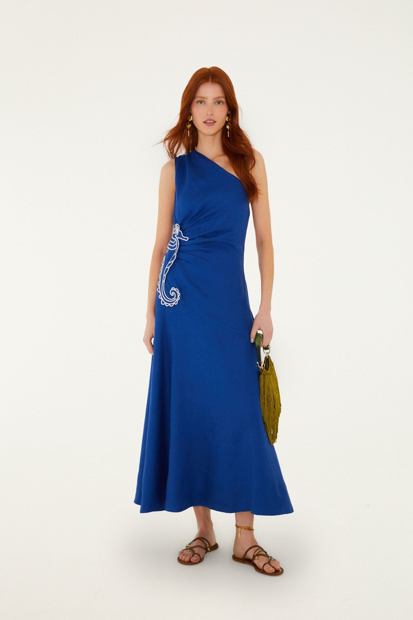 FARM Rio model wearing the Blue Seahorse Embroidery One-Shoulder Euroflax Premium Linen Maxi Dress