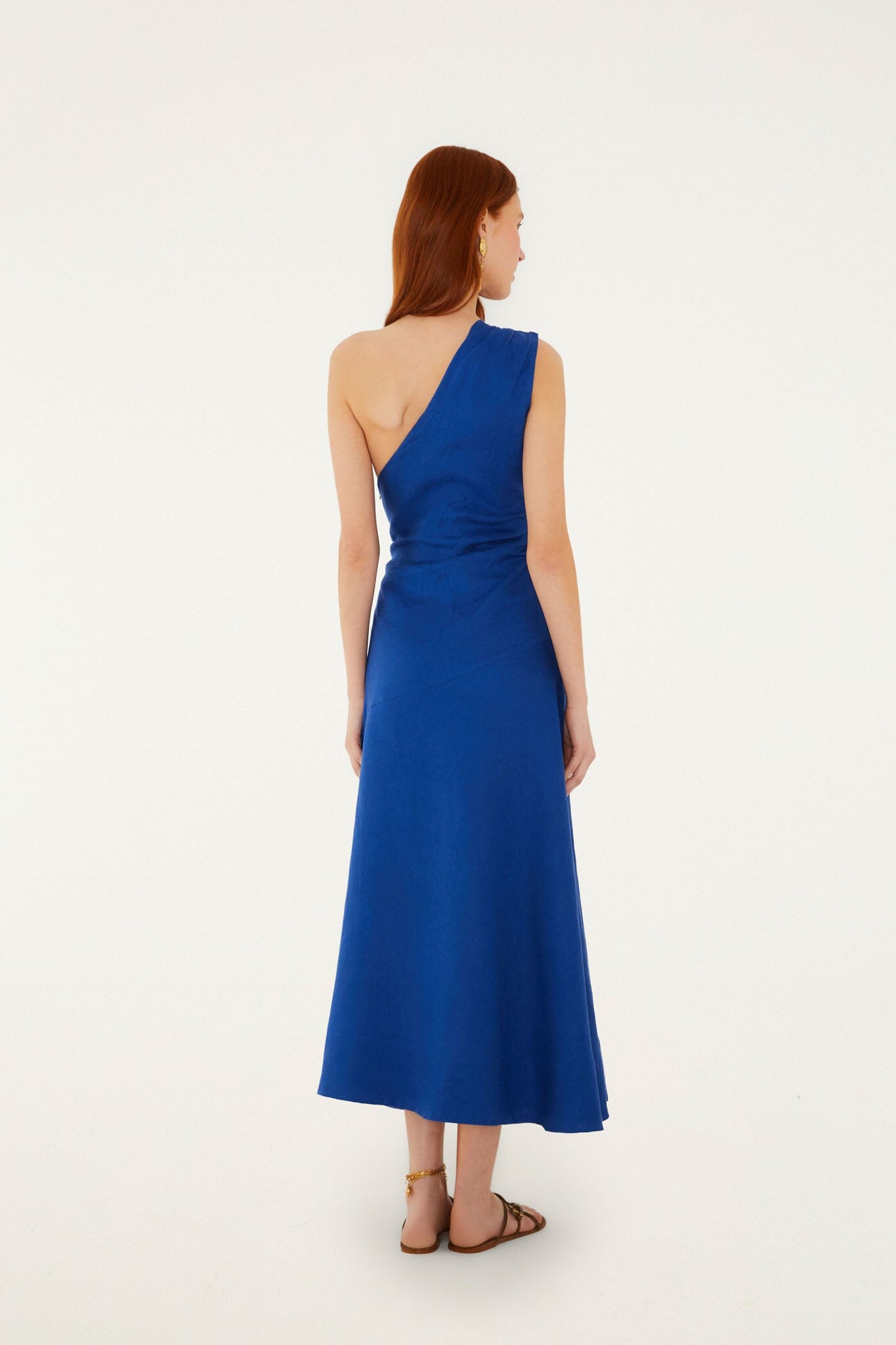FARM Rio model wearing the Blue Seahorse Embroidery One-Shoulder Euroflax Premium Linen Maxi Dress