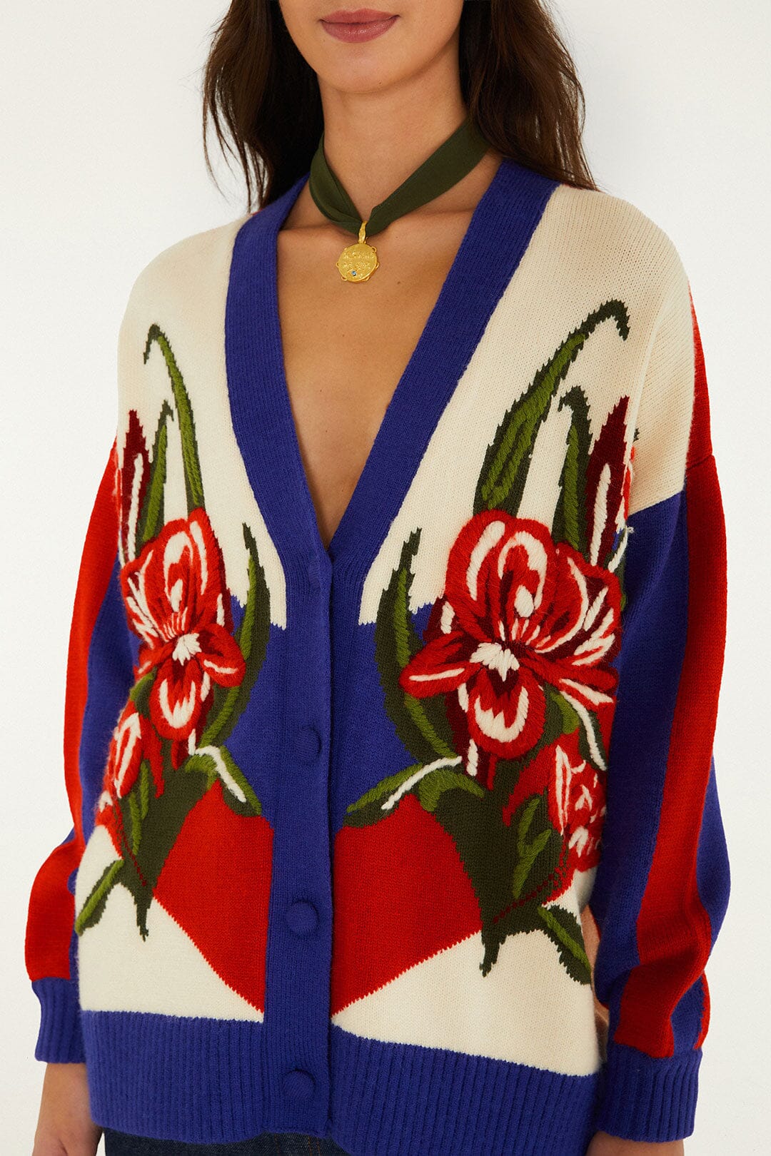 FARM Rio model wearing the Bold Stripe Flowers Buttoned Knit Cardigan