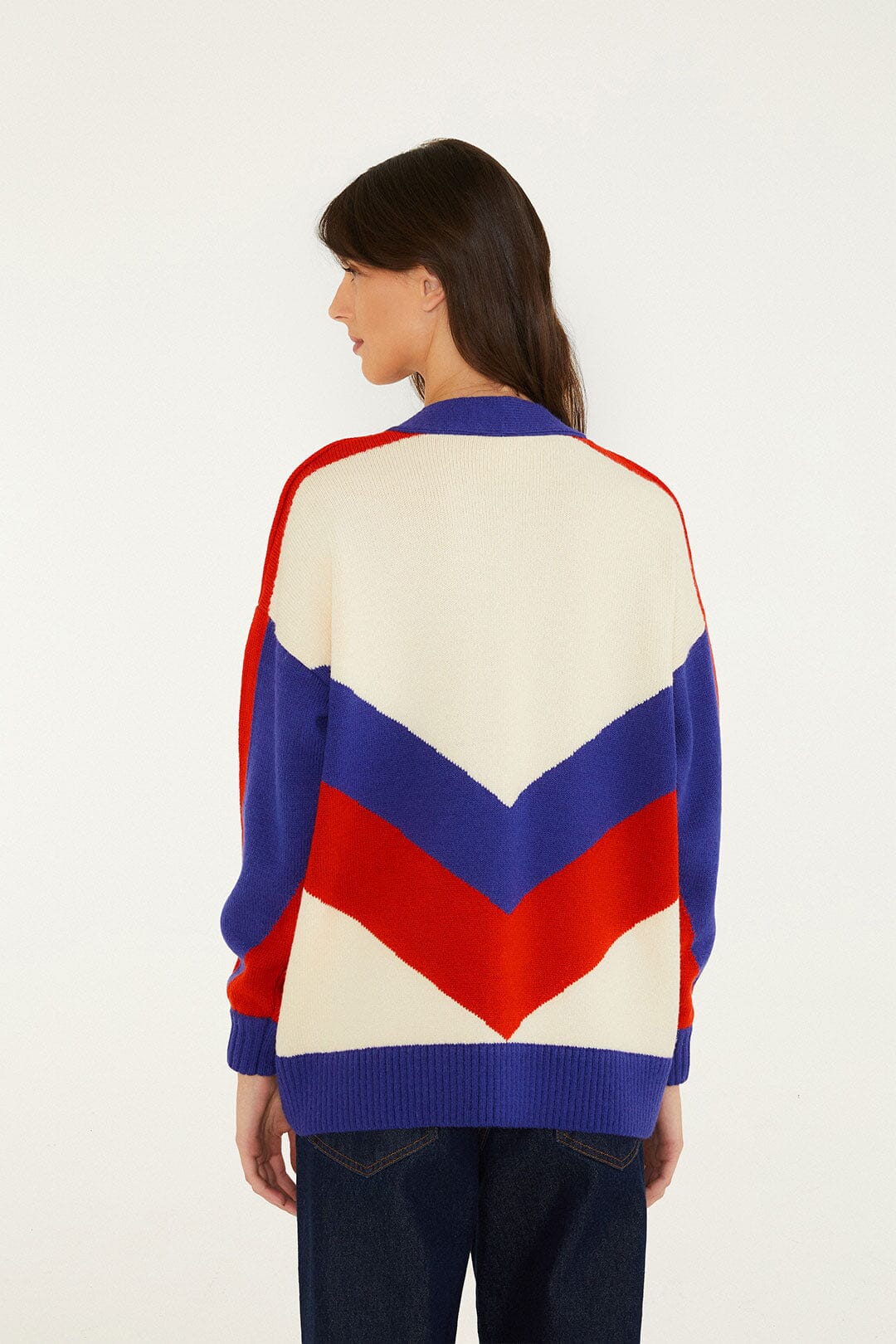 FARM Rio model wearing the Bold Stripe Flowers Buttoned Knit Cardigan