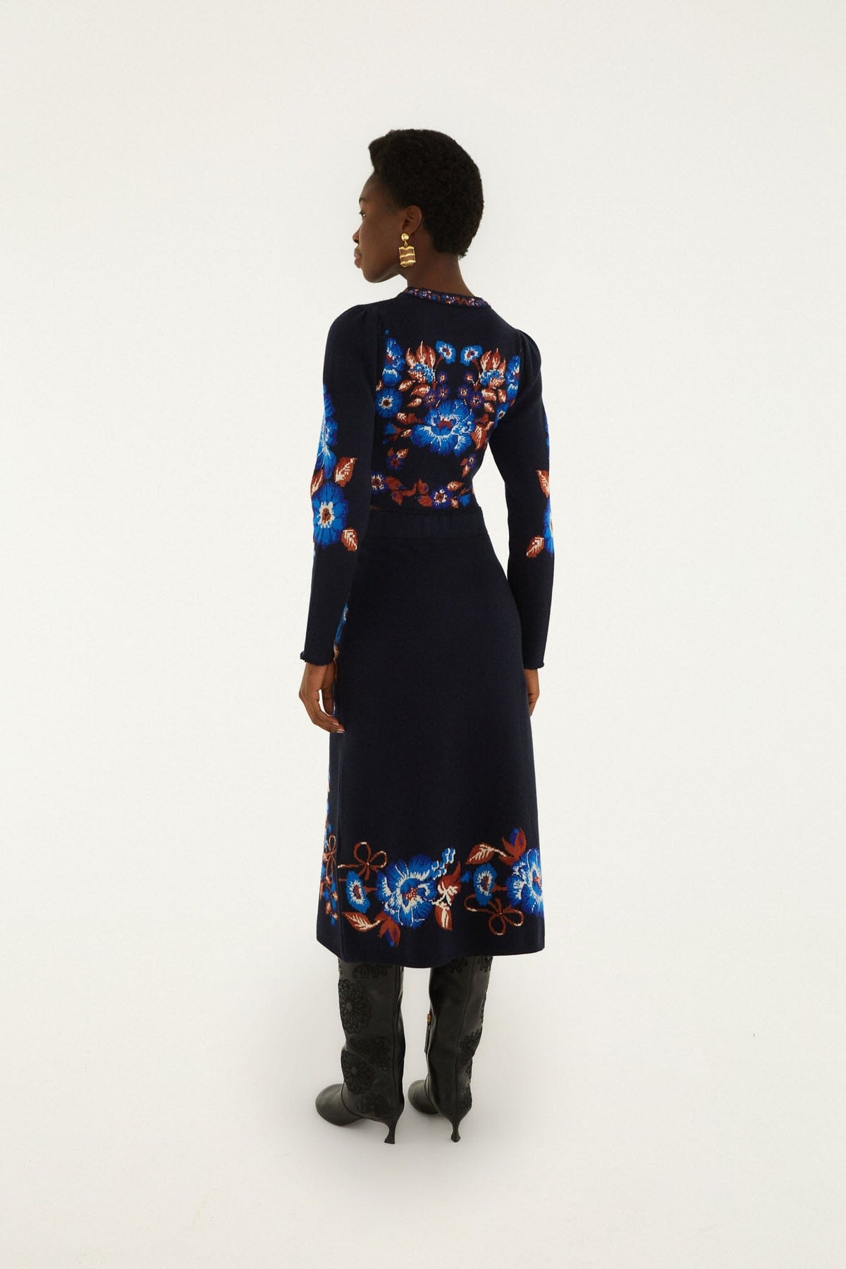 FARM Rio model wearing the Bow Garden Knit Midi Skirt
