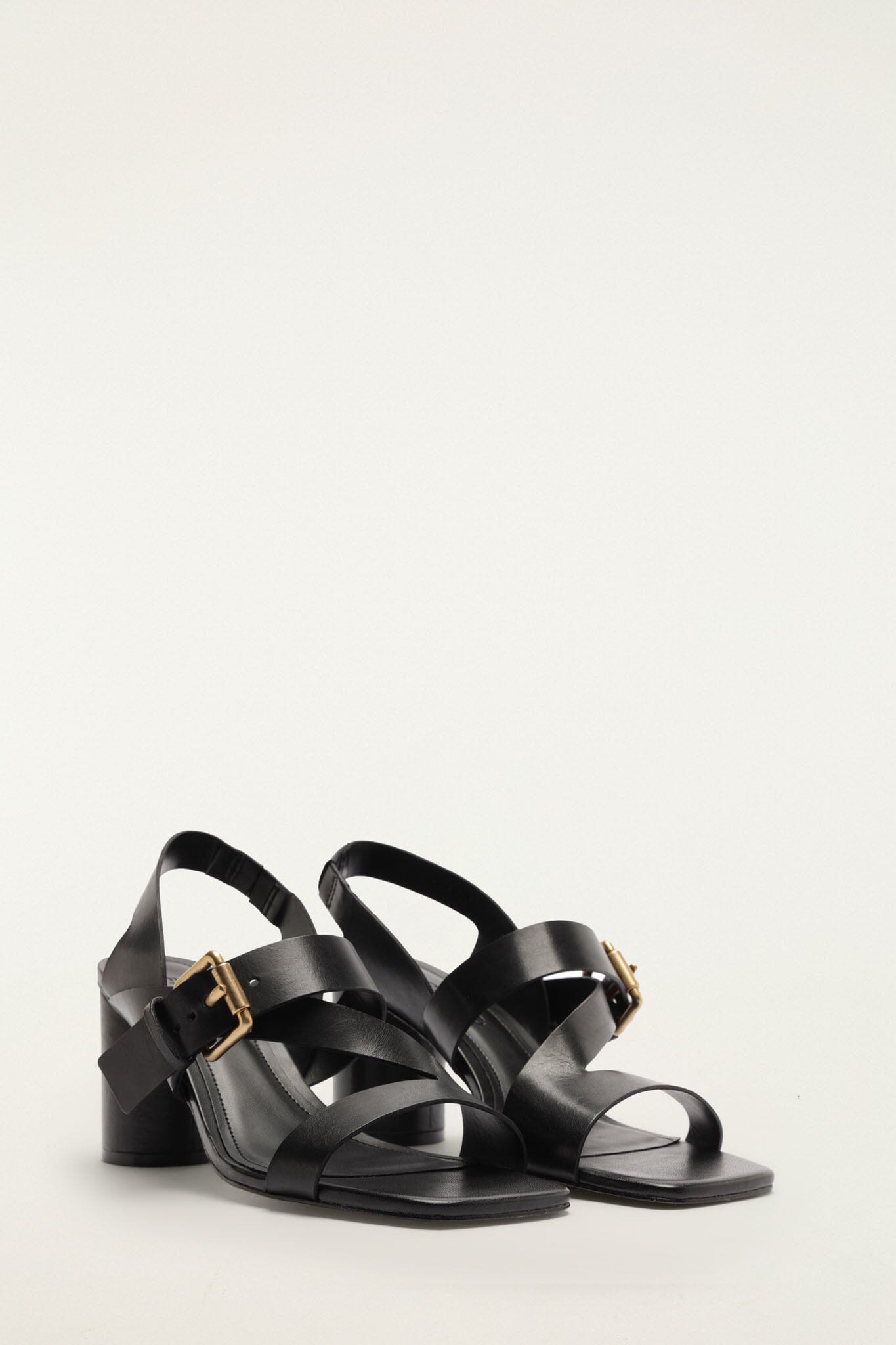 FARM Rio model wearing the Buckle Block Helled Sandal