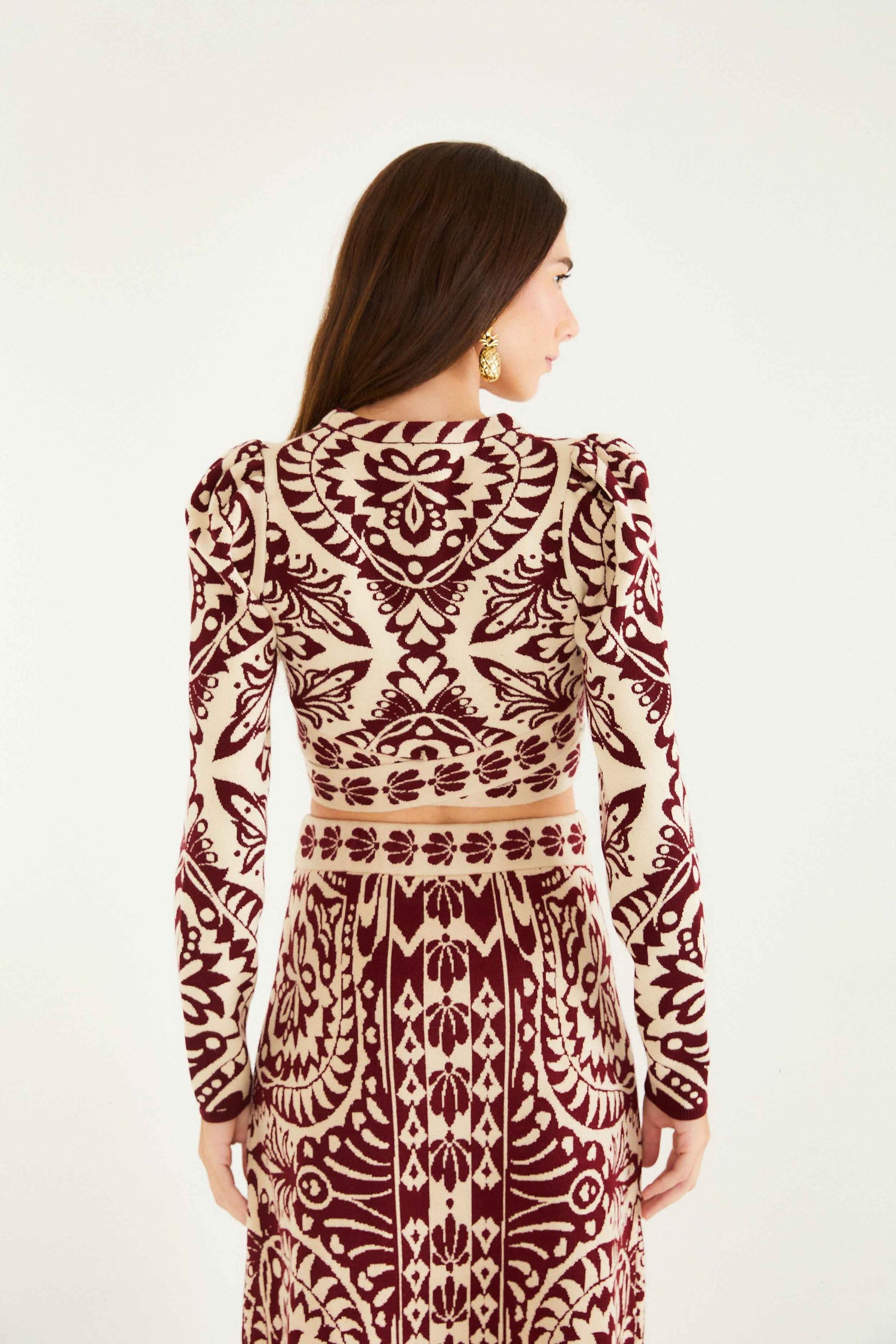 FARM Rio model wearing the Burgundy Pineapple Love Knit Top