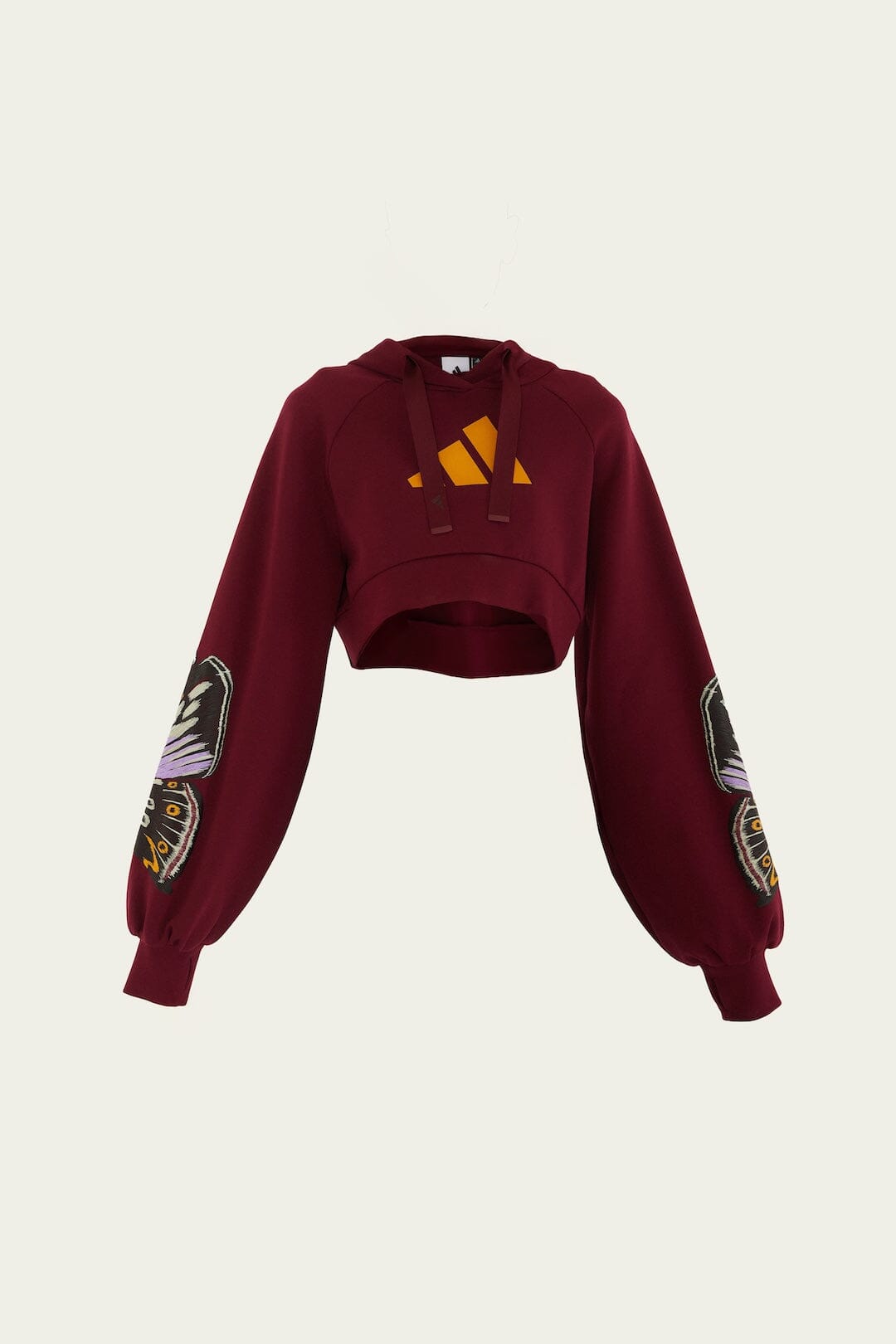 FARM Rio model wearing the Colorfly Adidas Amazon Red Hoodie