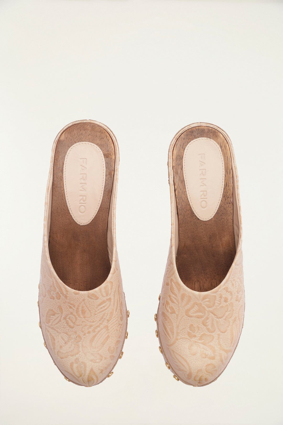 FARM Rio model wearing the Cream Embossed Wedge Clog