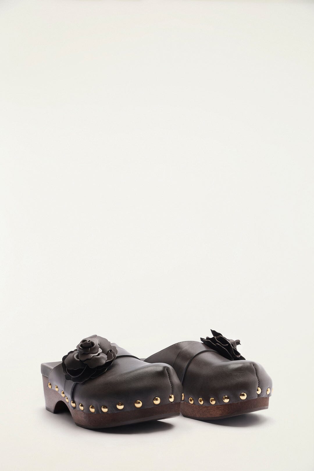 FARM Rio model wearing the Dark Brown Flower Clog